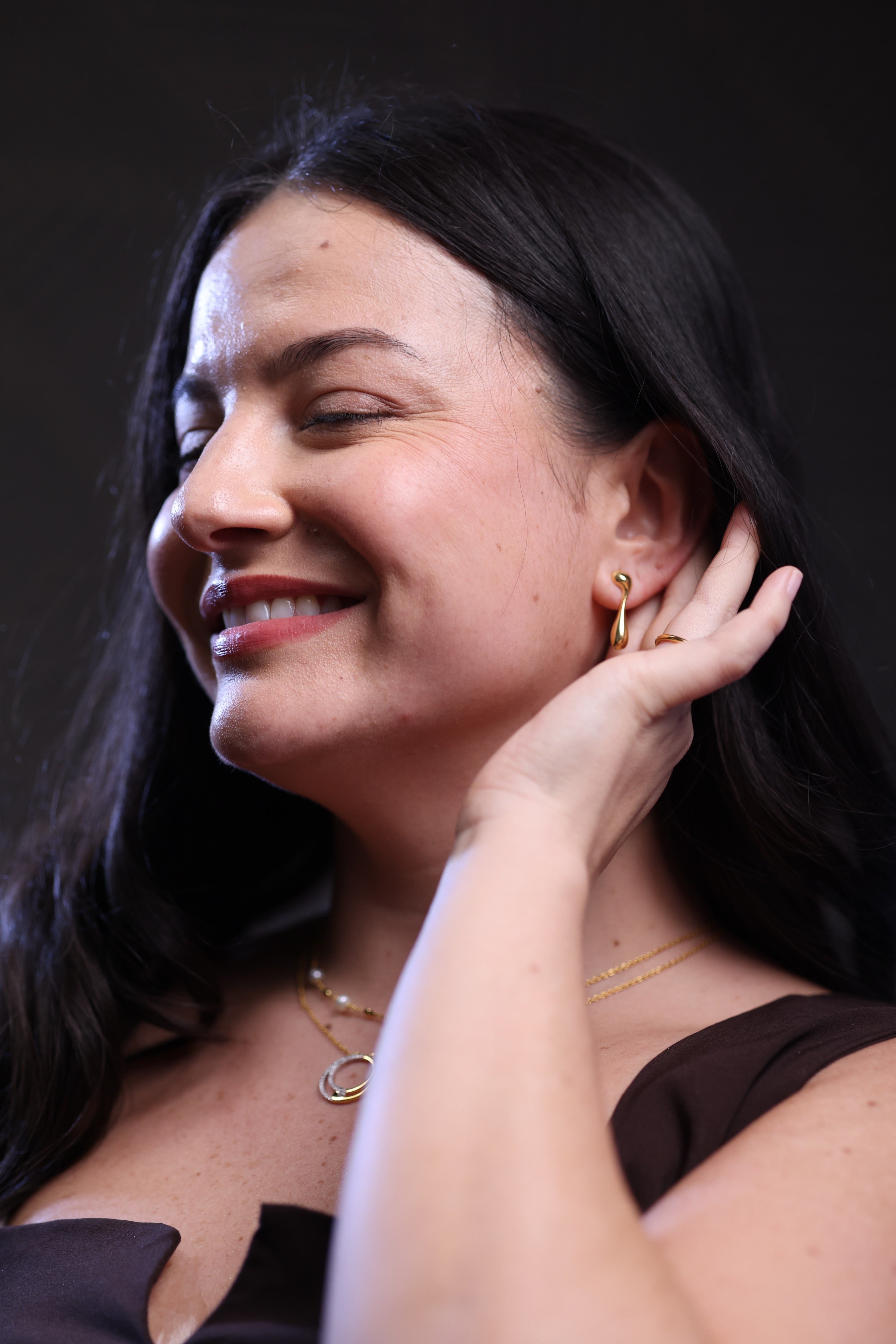 Dhara Earring sculptural elongated fluid curve minimalist jewelry design