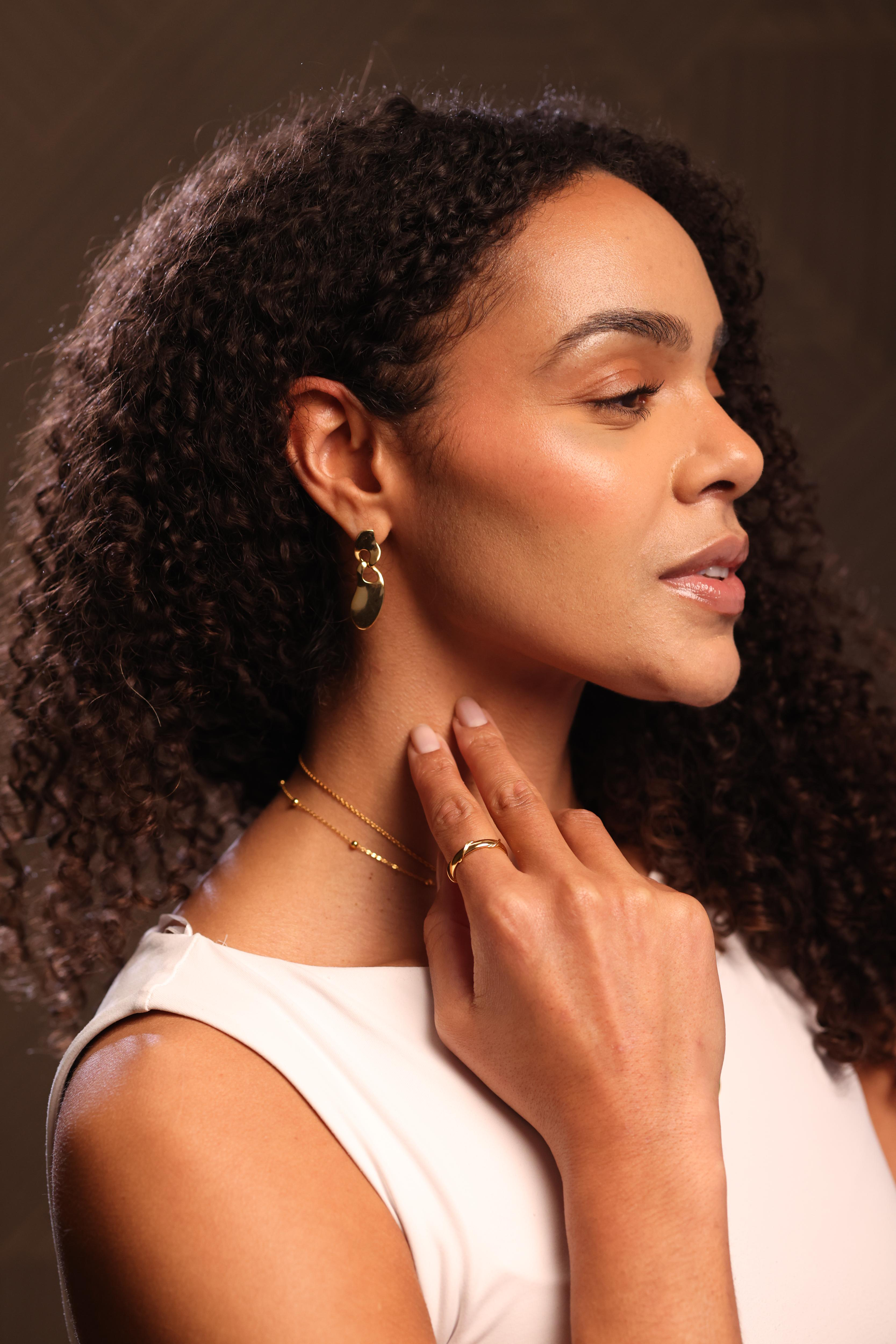 Pravah Earring with flowing organic shapes and elongated silhouette showcasing gentle movement and natural rhythm