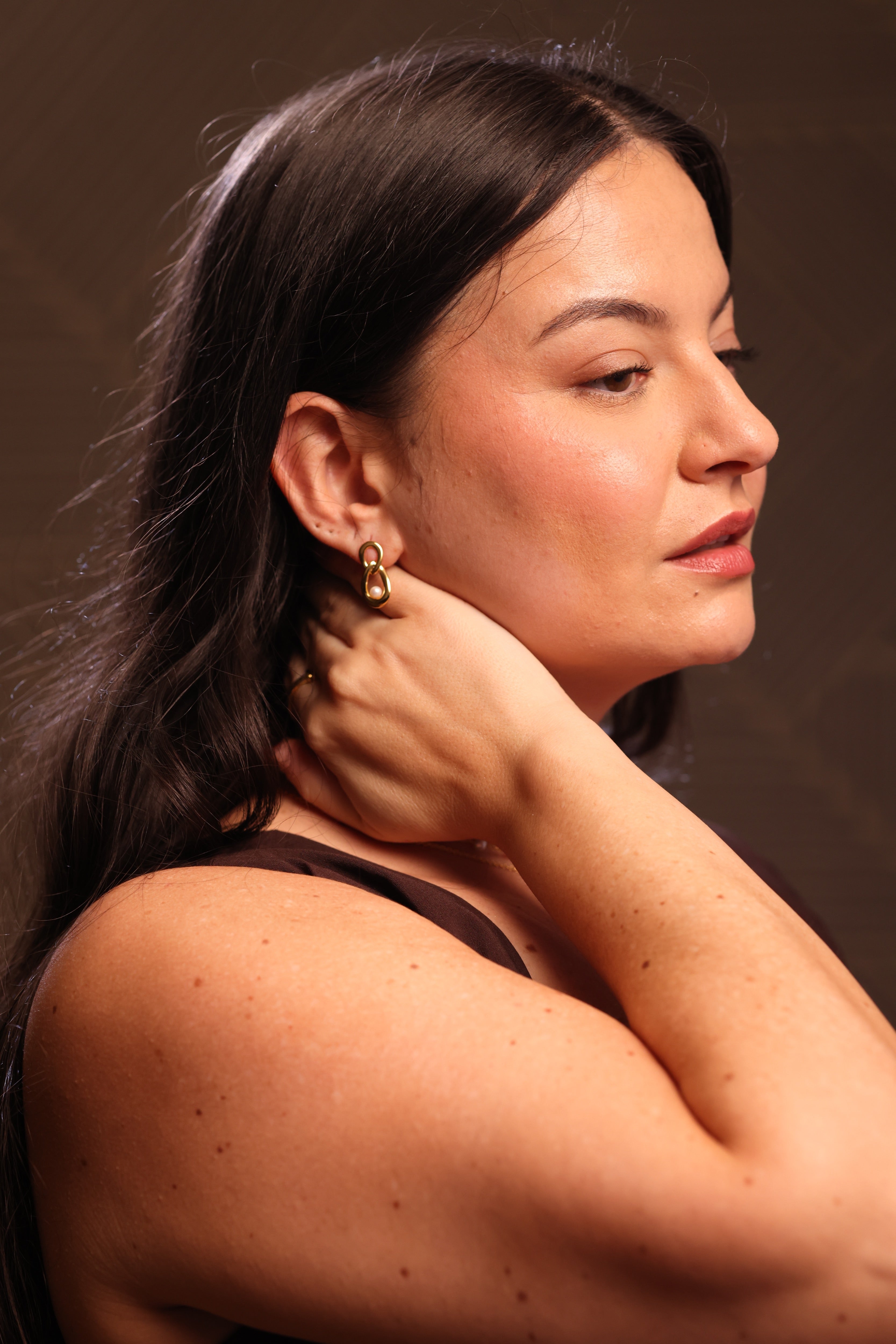 Yukti Earring with two open vertical oval forms in a refined modern design