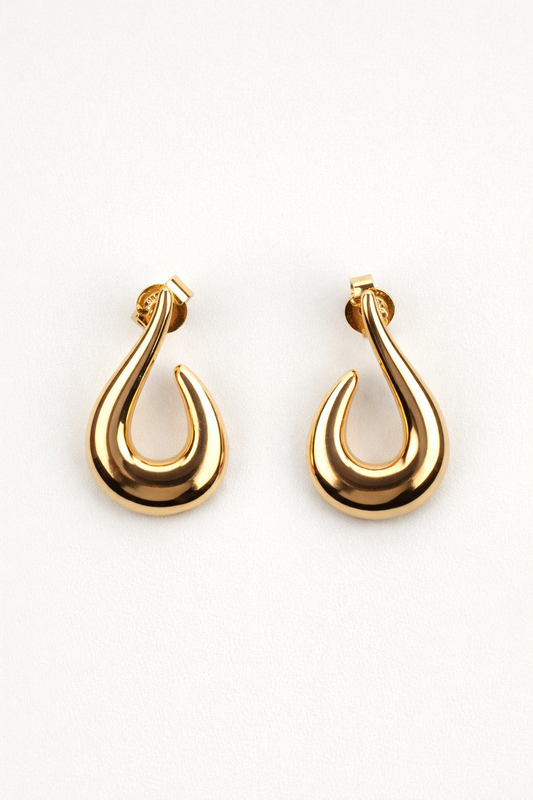 Sculptural Akar Earring with bold continuous curve and minimal expressive design