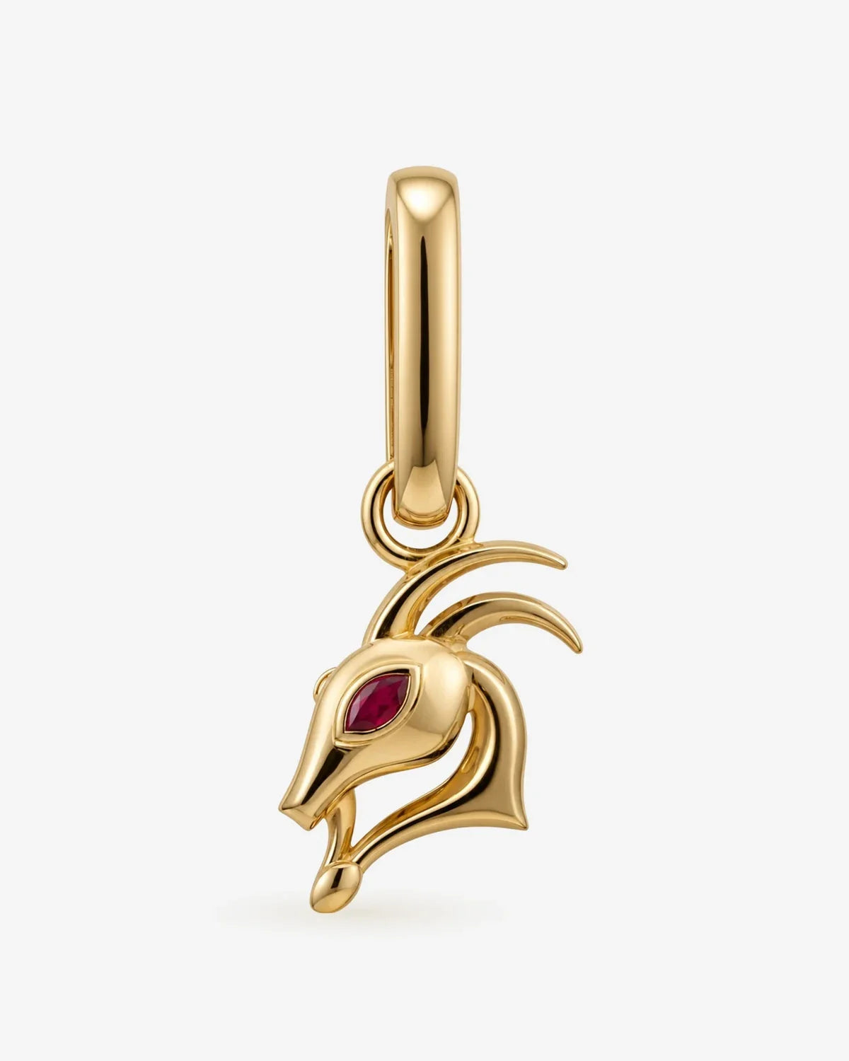 Symbol of Capricorn - Makara, the patient sea goat with red garnet, representing Saturn's purposeful and silent builder sign