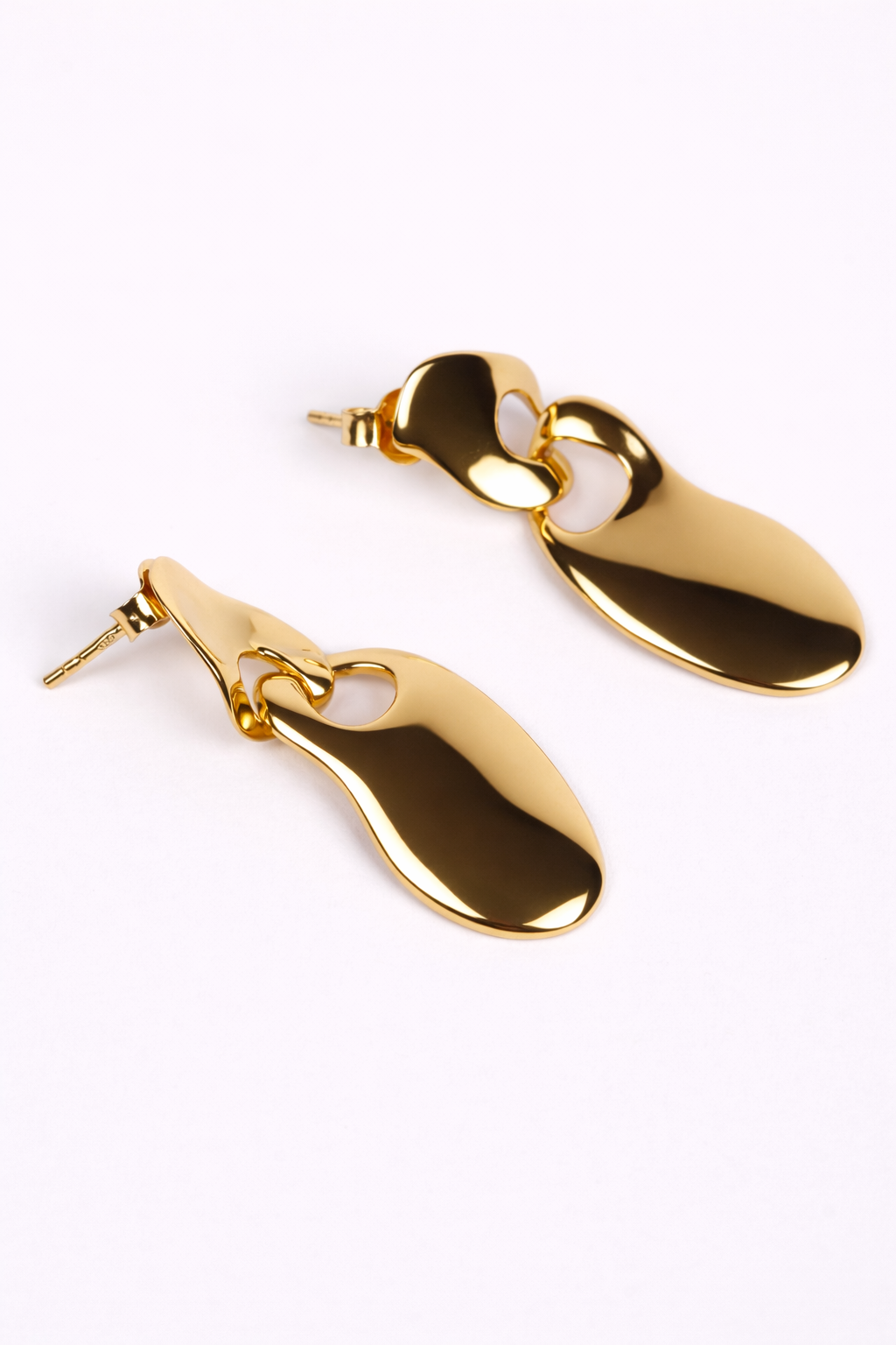 Pravah Earring with flowing organic shapes and elongated silhouette showcasing gentle movement and natural rhythm