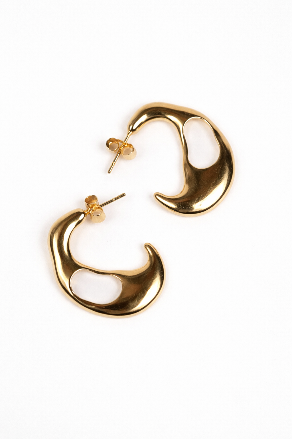 Kala Earring crescent-shaped with soft edges and balanced curved silhouette