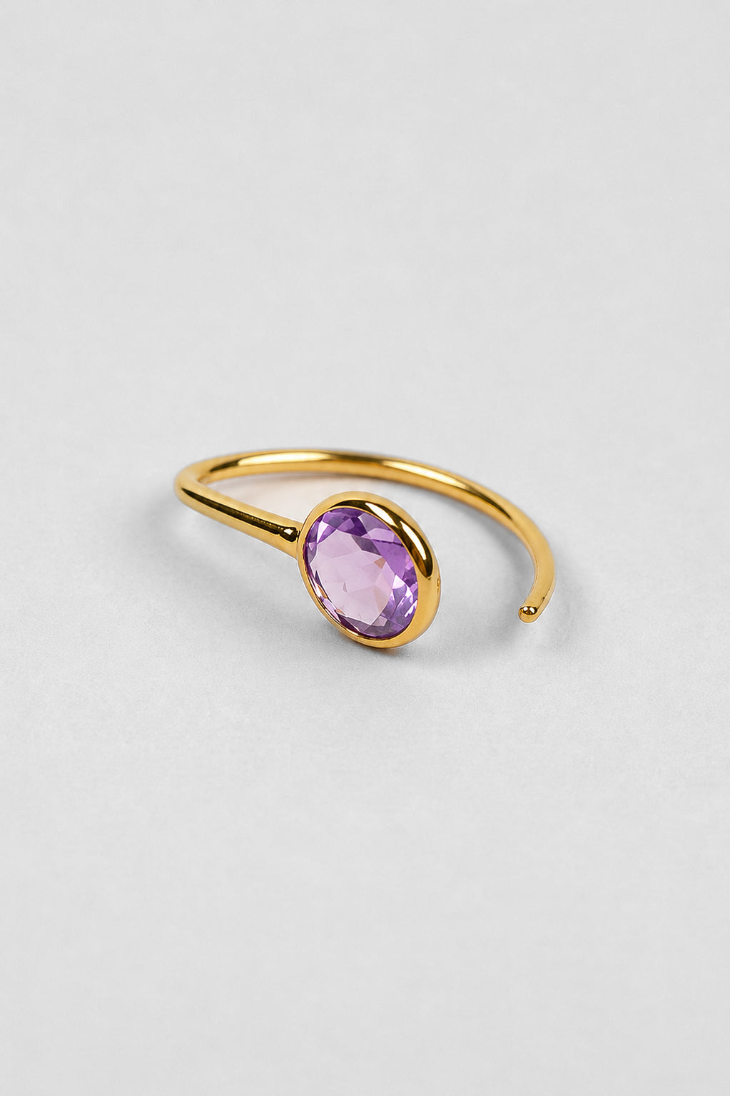 Manvi Earrings with brilliant cut Amethyst stones featuring a refined, minimal design