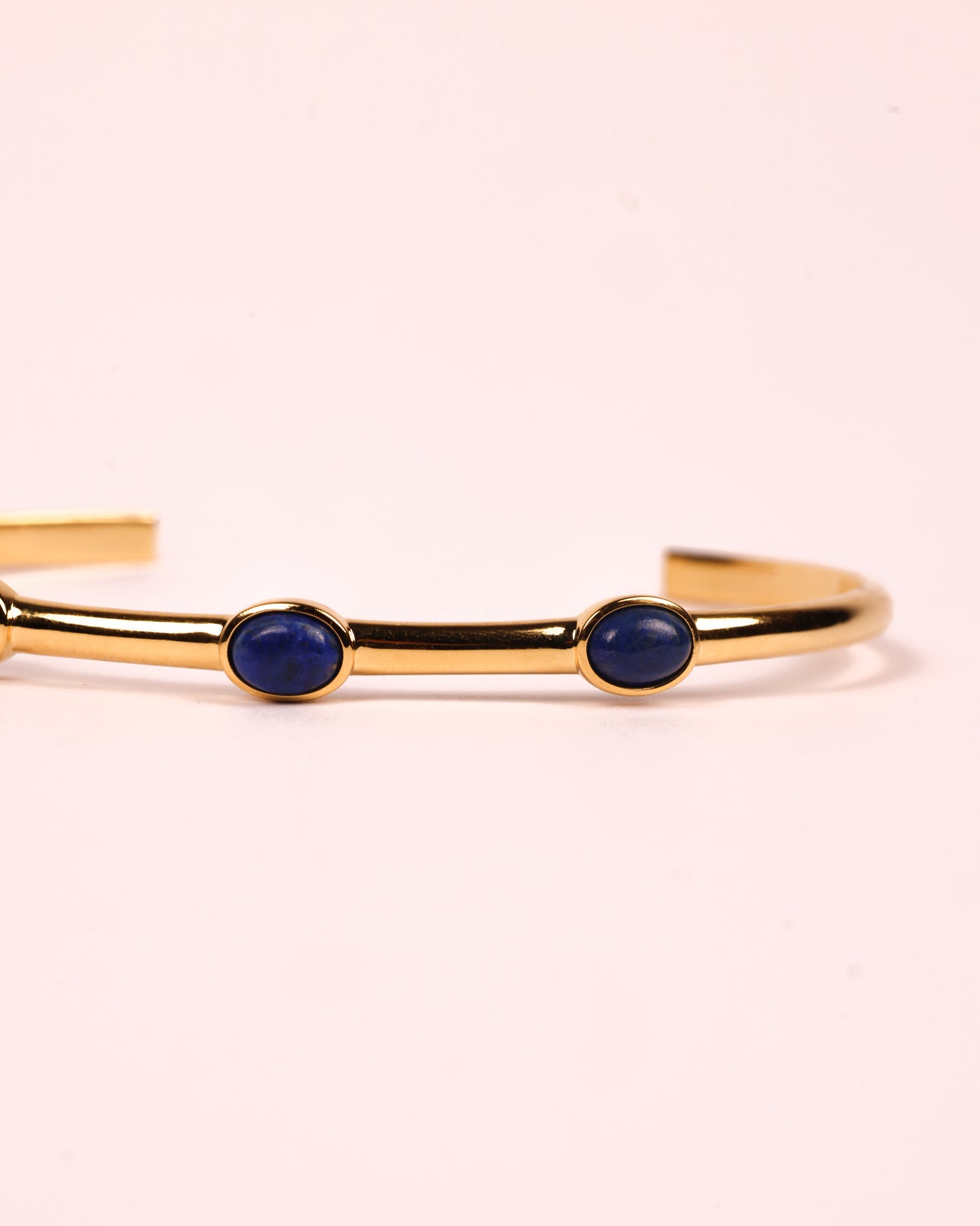 Trivena Cuff with three oval blue lapis lazuli stones in minimal gold setting