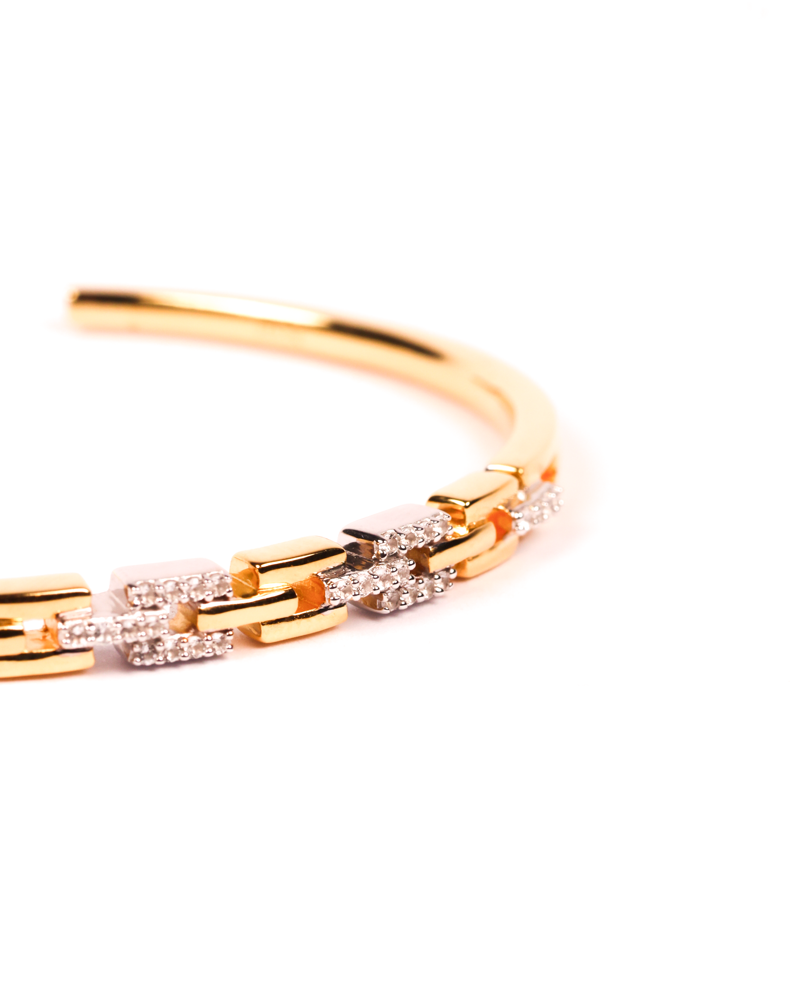 Noura Cuff with interlocking 18K gold vermeil and 925 sterling silver links holding 53 white topazes