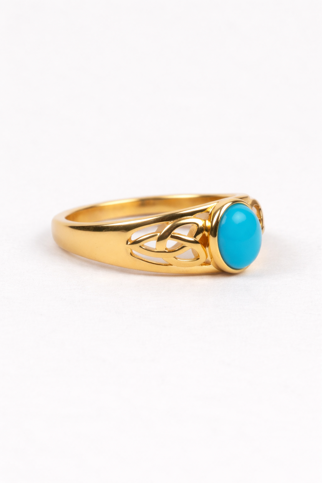 Neera Ring with smooth oval turquoise set in openwork gold band for timeless elegance