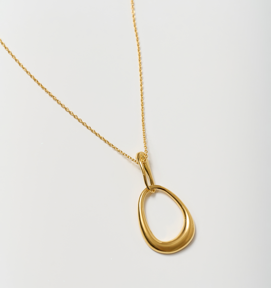 Bindu Necklace gold sculpted drop pendant on delicate chain