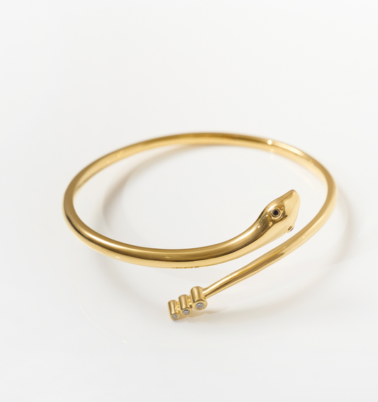 Sarpa Cuff gold serpent bracelet with black spinel eyes and diamond detail