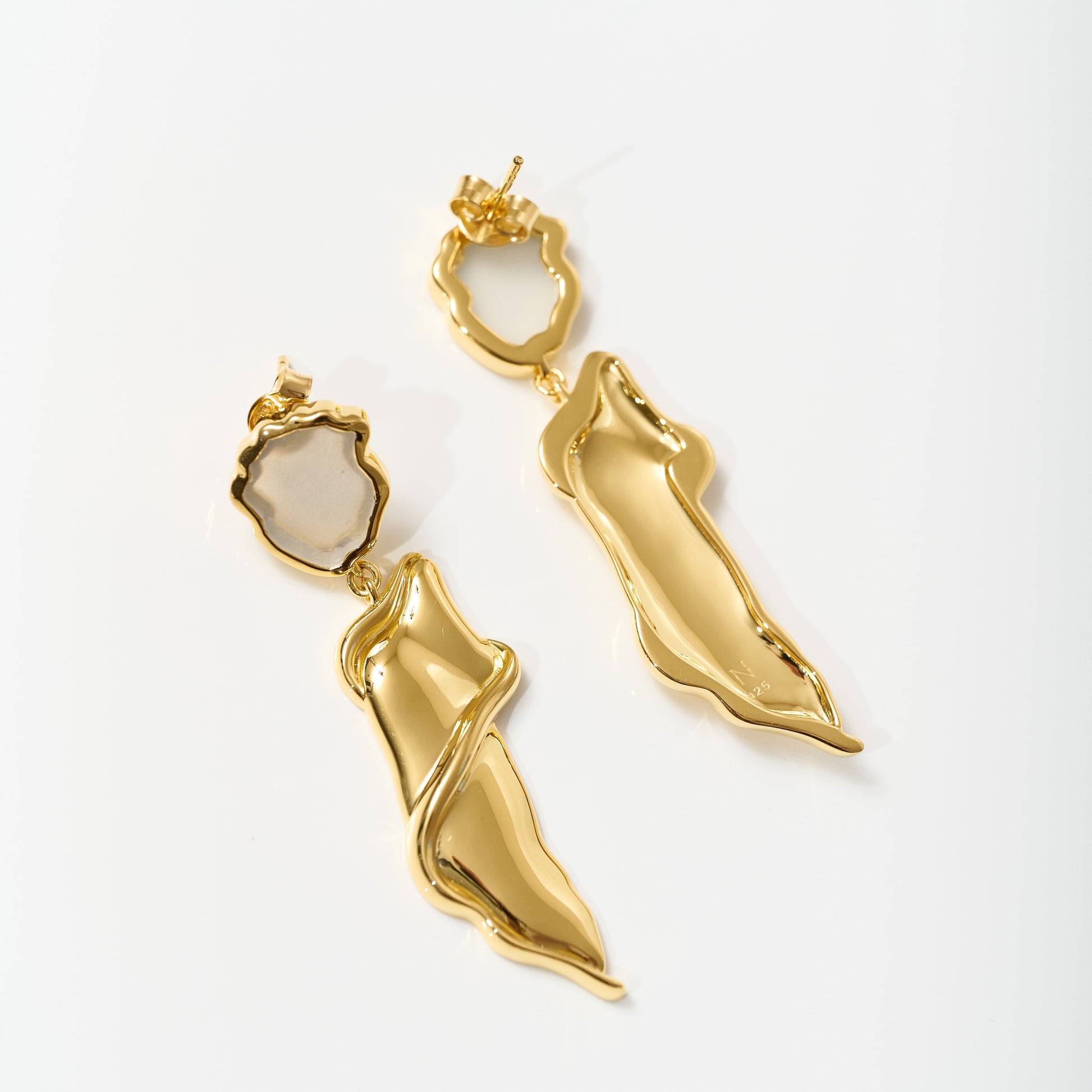 Elegant gold Thalena Earrings with sculpted design and moonstone accents