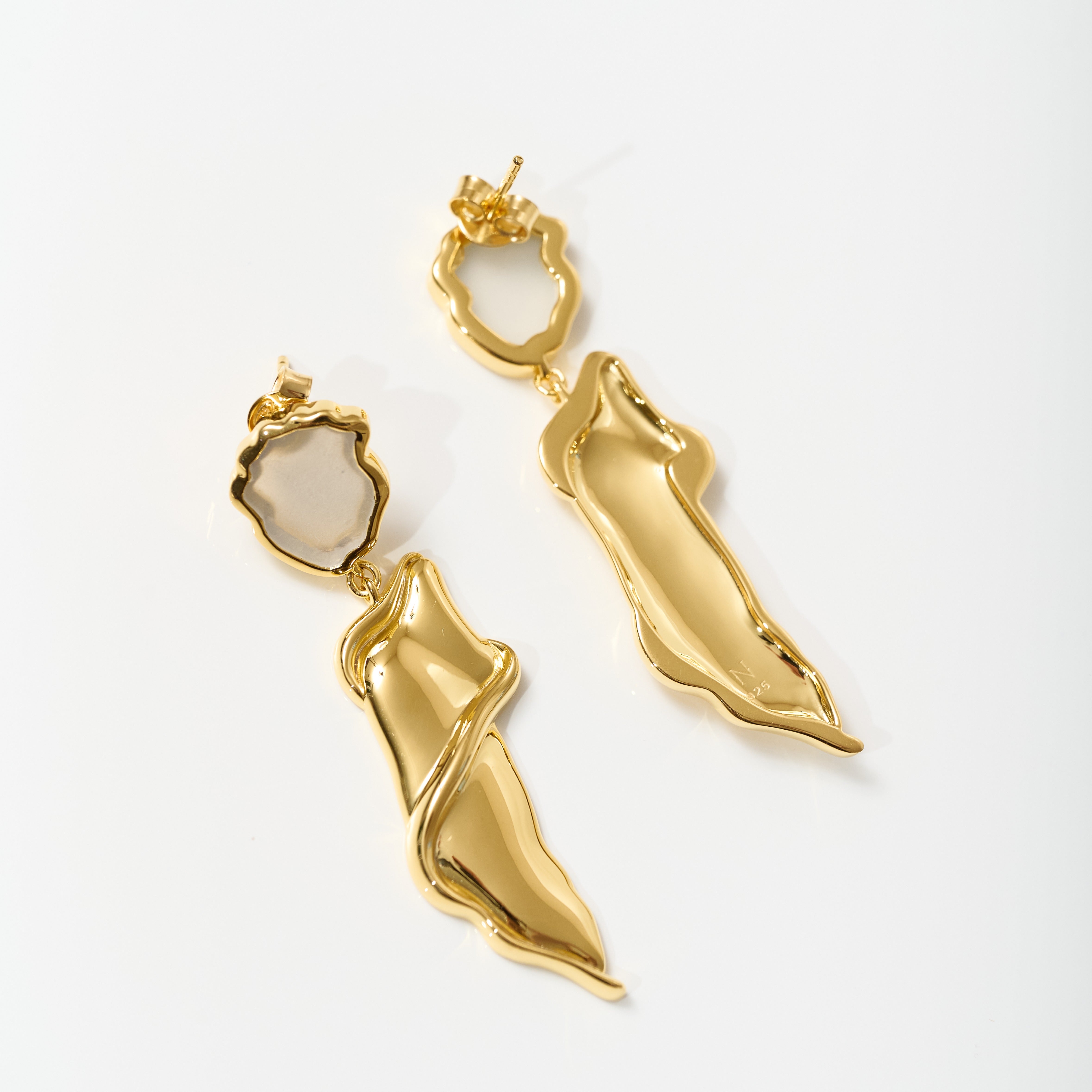 Elegant gold Thalena Earrings with sculpted design and moonstone accents