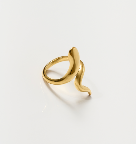 Saachi Ring luminous gold ring with bold sweeping design and elegant curved form