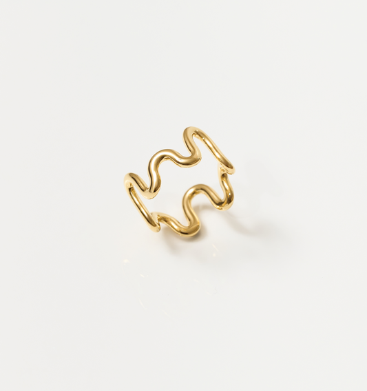 Gold Neer Ring with wavy ripple design inspired by water motion