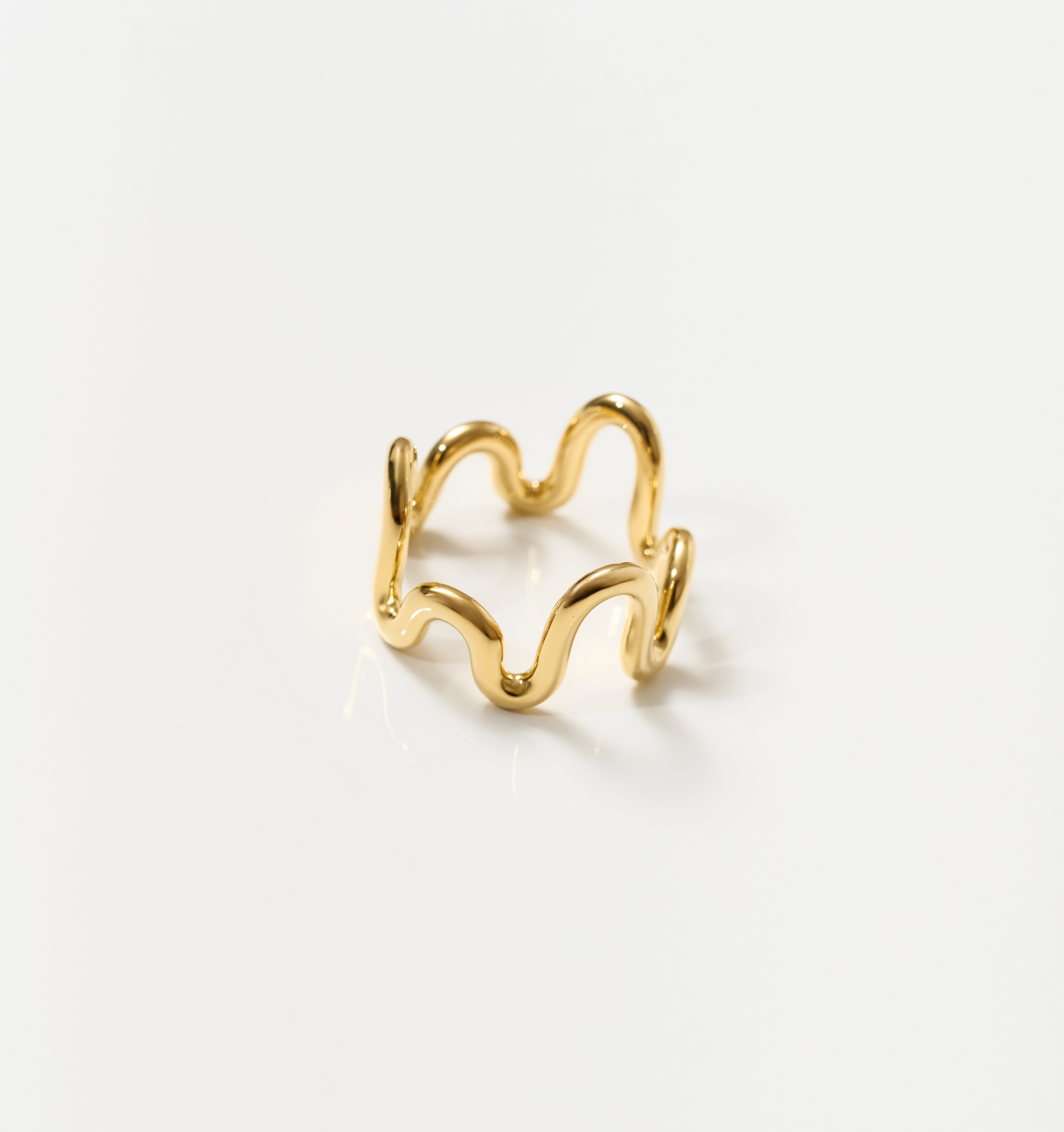 Neer Ring gold ripple design jewelry shaped like frozen water curve