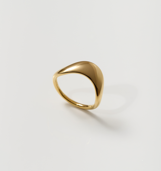Minimalist smooth gold Alav Ring symbolizing calm and harmony in motion