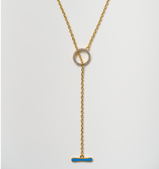 Orya Necklace gold chain with white topaz circle and blue bar pendant design