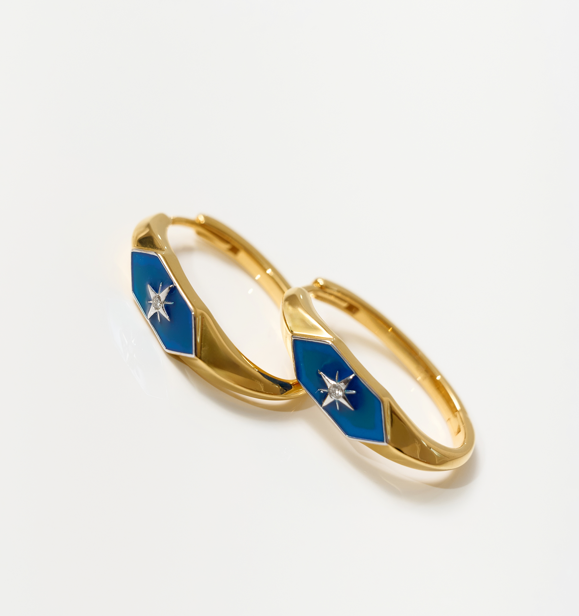 Gold Lumira Hoops with blue enamel and star design detail