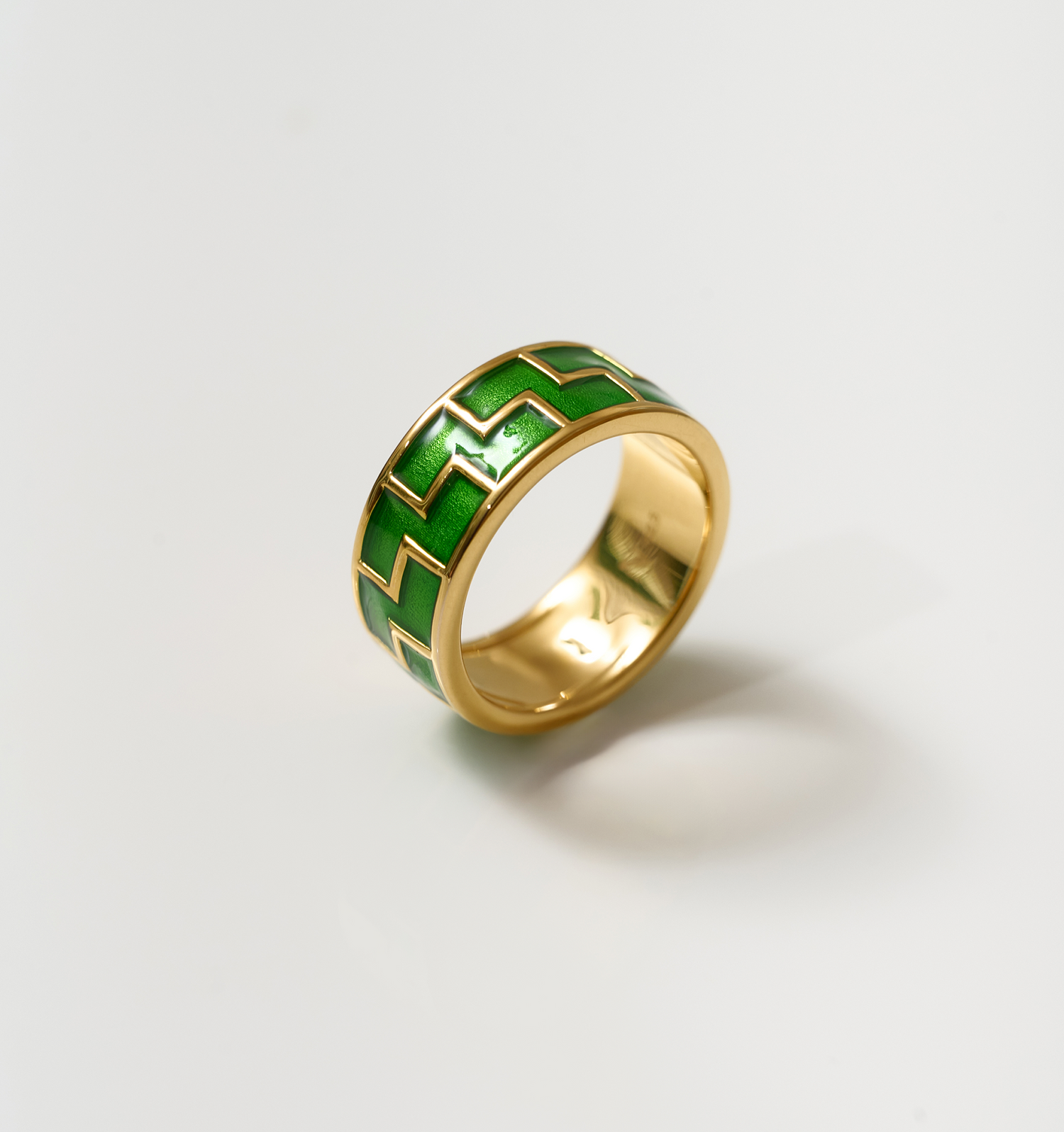 Arohi Ring gold band with green geometric enamel design