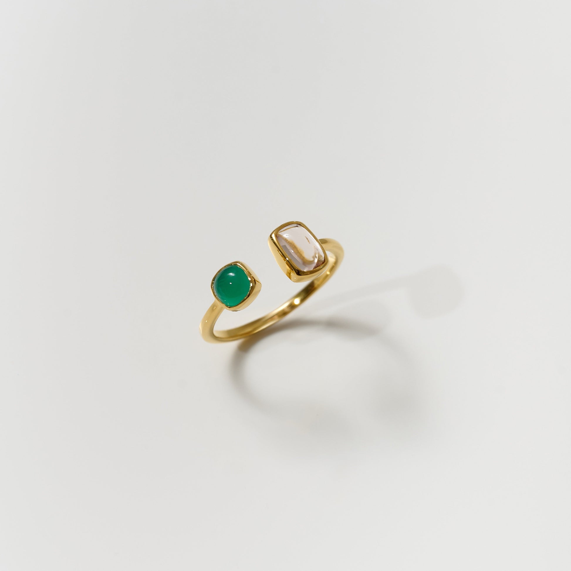 Tulaa Ring with gold band featuring green onyx and morganite gemstones balancing clarity and grace