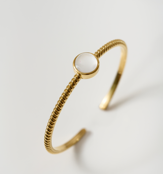 Tarini Cuff gold bracelet with round moonstone centerpiece for balance and intuition