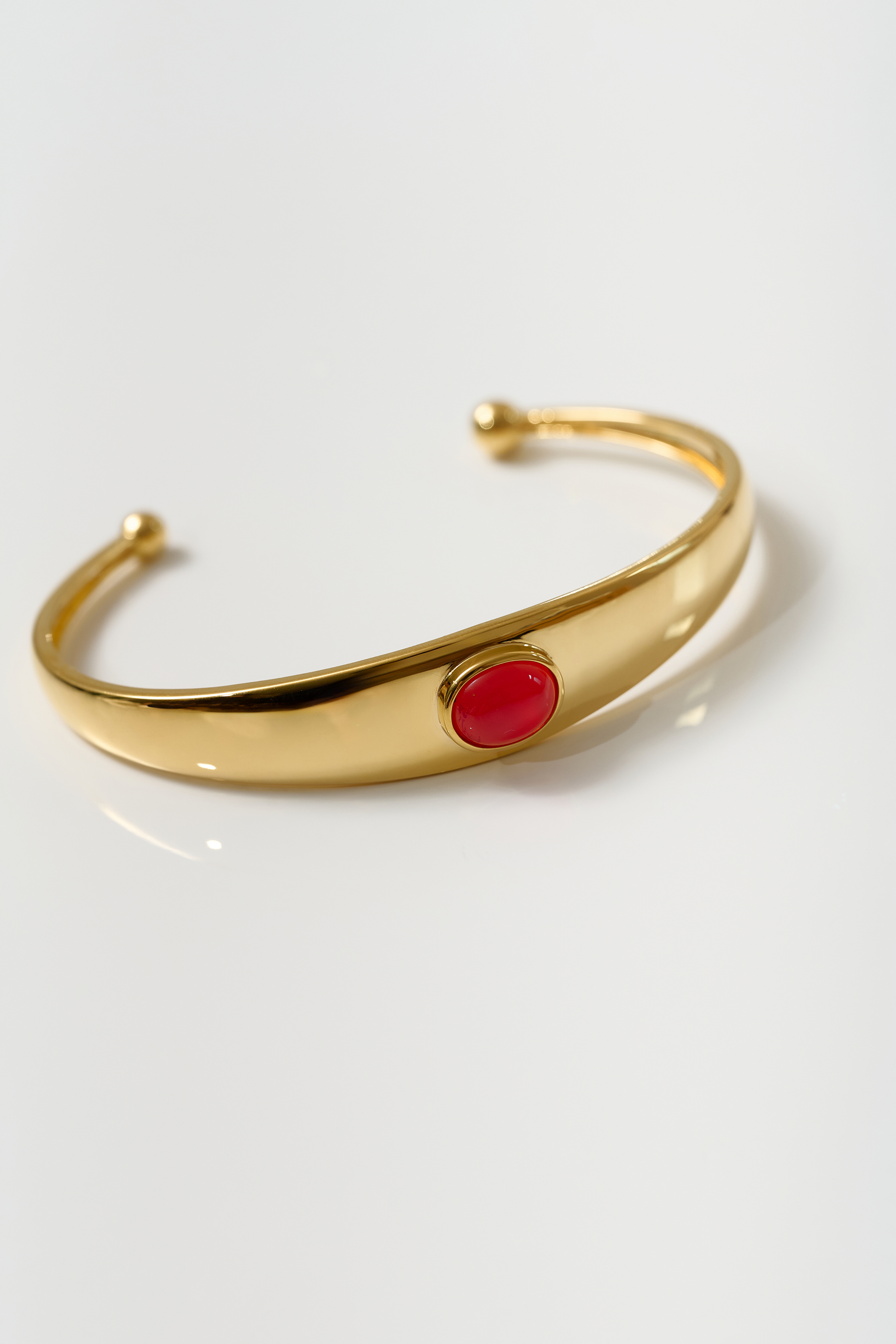 Dhruva Cuff gold bracelet with red onyx stone for grounded courage and clarity