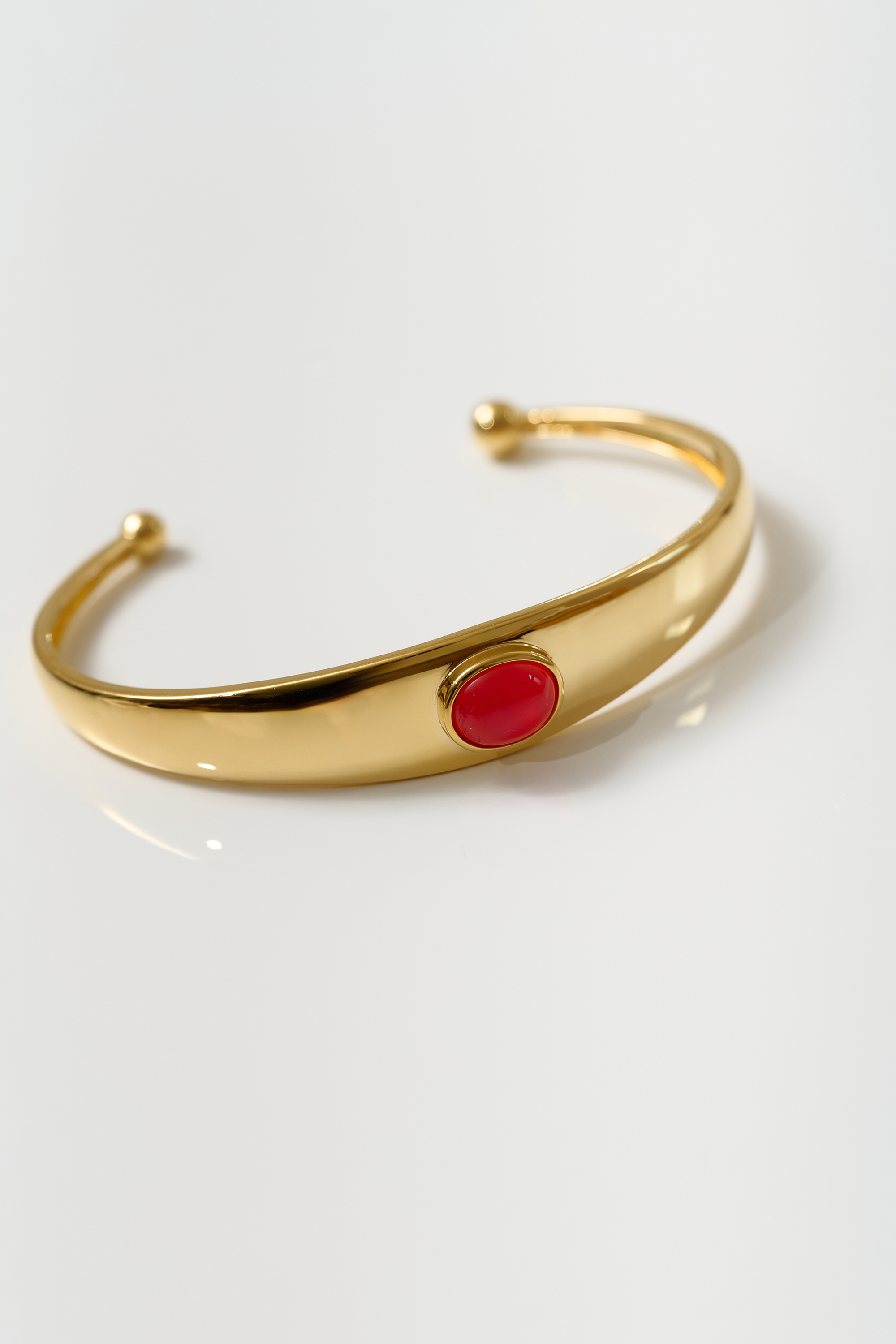 Dhruva Cuff gold bracelet with red onyx stone for grounded courage and clarity