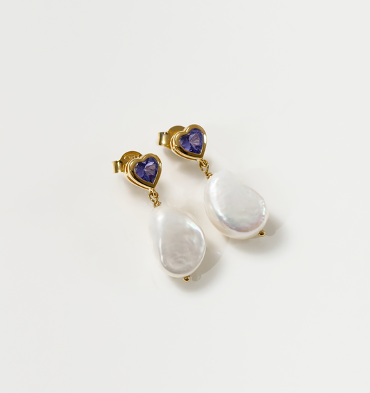 Hridaya Earrings with heart-shaped tanzanite and dangling pearl drops in gold setting