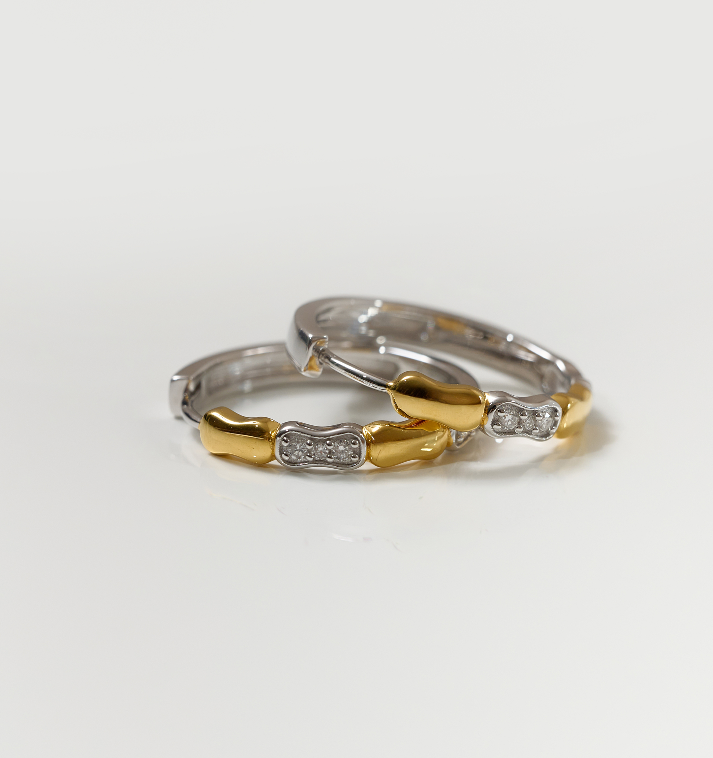 Orita Earrings gold and silver hoop earrings with sparkling stones