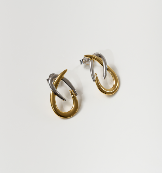 Syra Earrings gold and silver interlocking arcs minimalist bold design