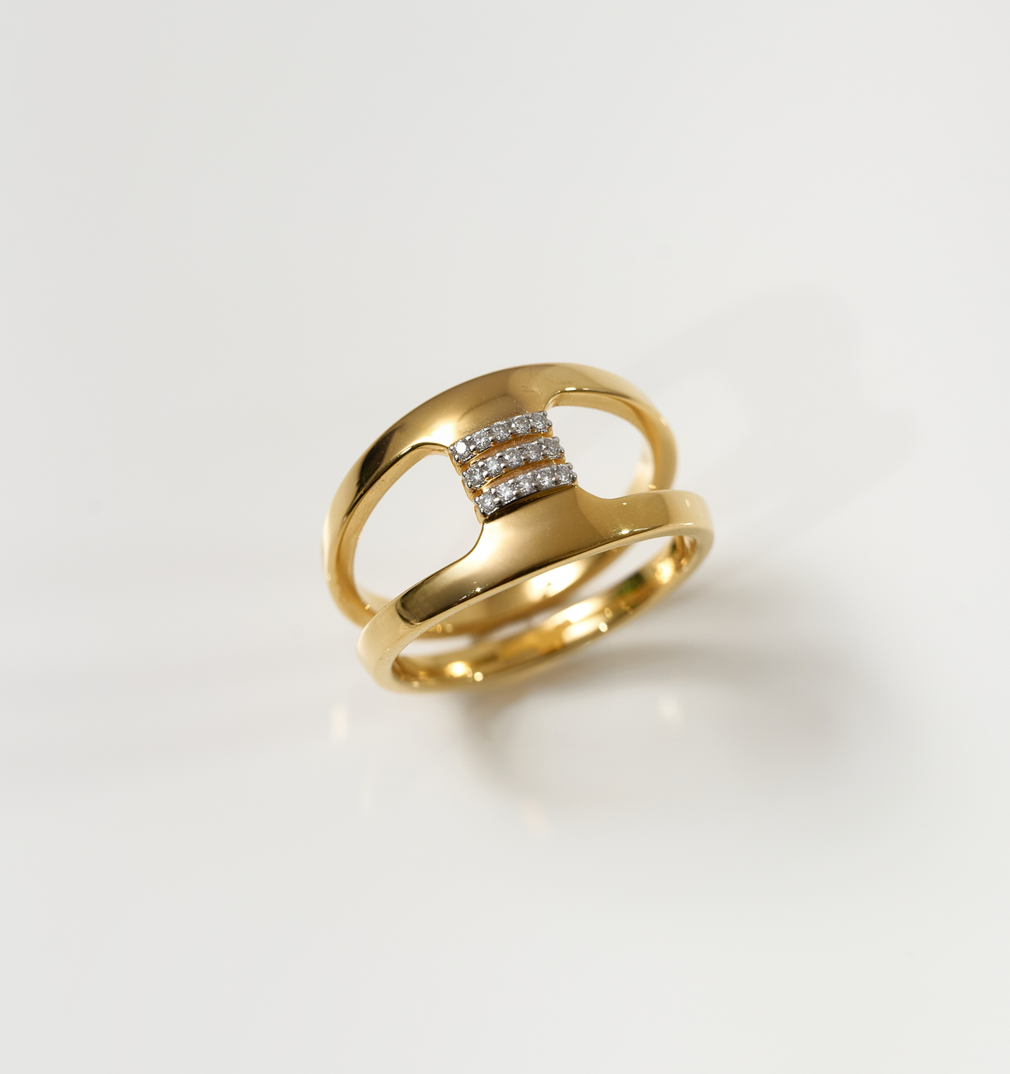 Setu Ring gold with white topaz bridge and two linked arcs symbolizing clarity and connection