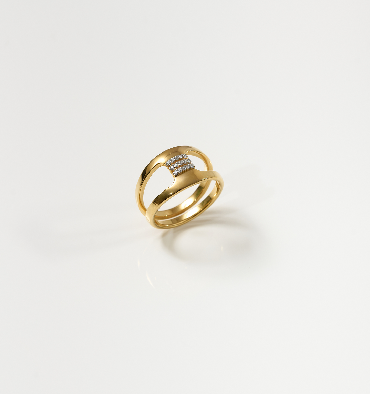 Setu Ring gold band with two arcs connected by white topaz bridge symbolizing clarity and connection