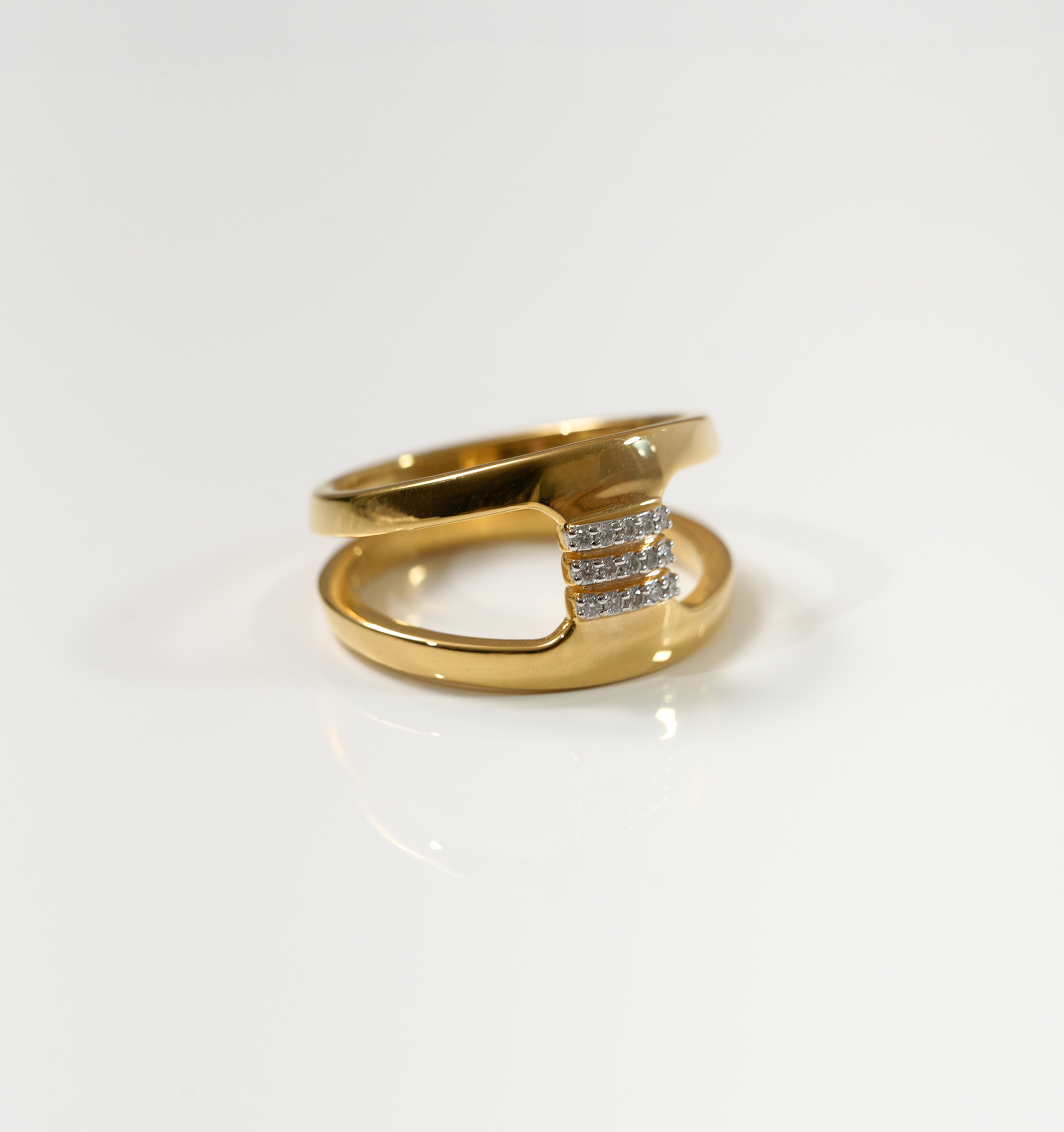 Setu Ring gold with two arcs linked by white topaz bridge symbolizing clarity and connection