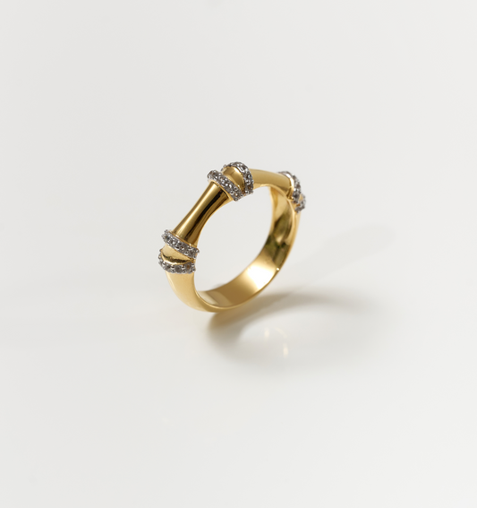 Ansh Ring gold band with white topaz accents inspired by bamboo strength and geometric design