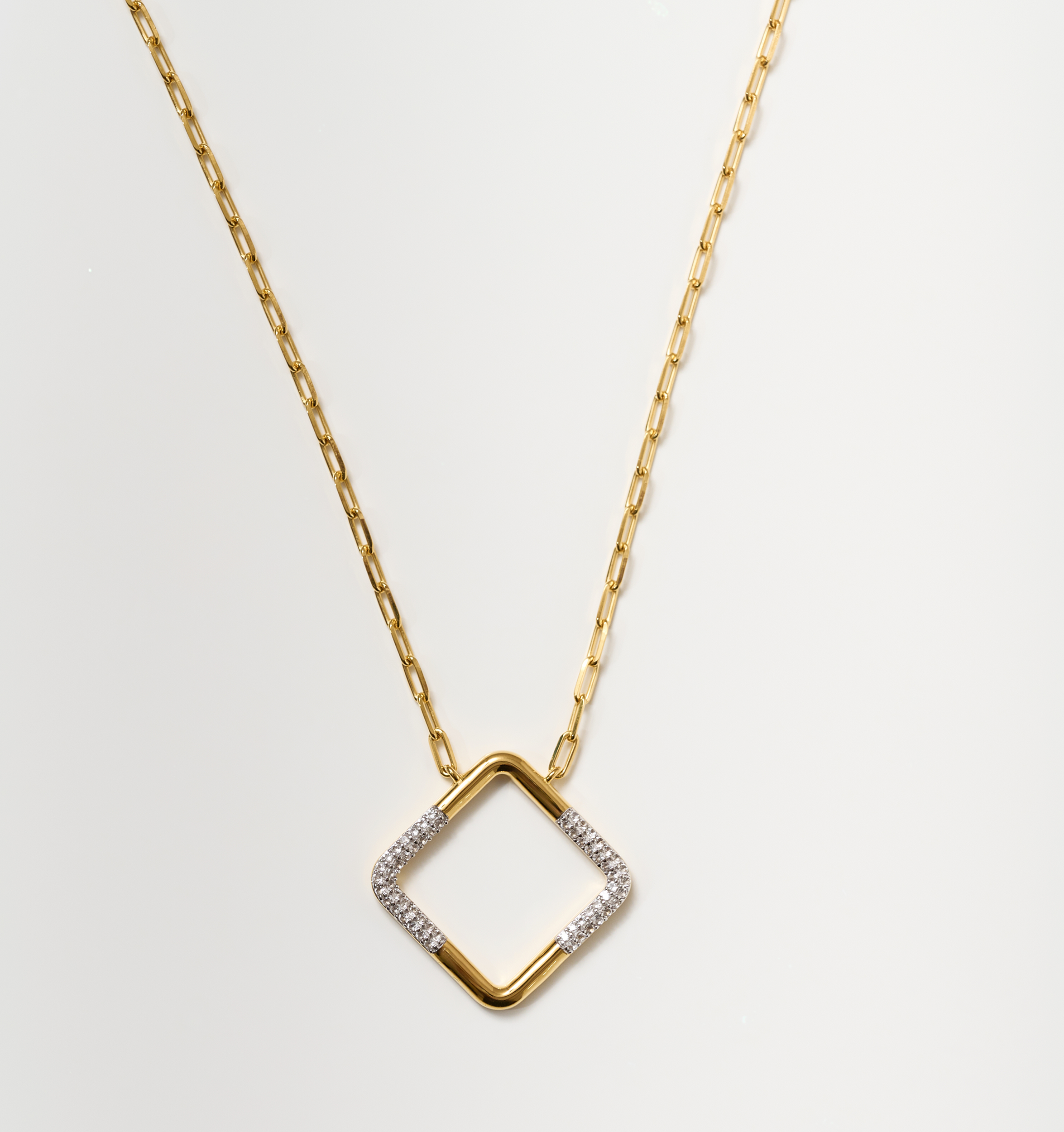 Trayi Necklace gold chain with diamond-studded square pendant and white topaz accents