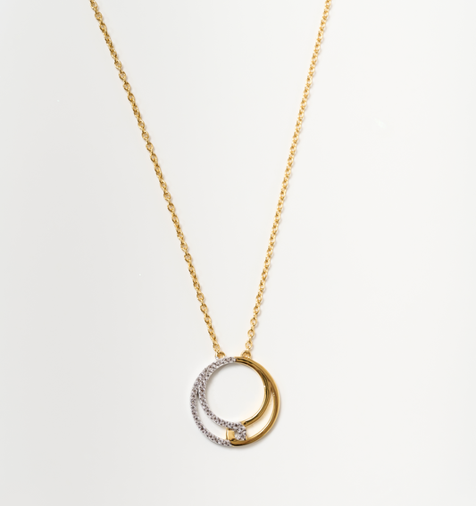 Nayra Necklace gold chain with intertwined silver and gold circles pendant symbolizing unity and strength