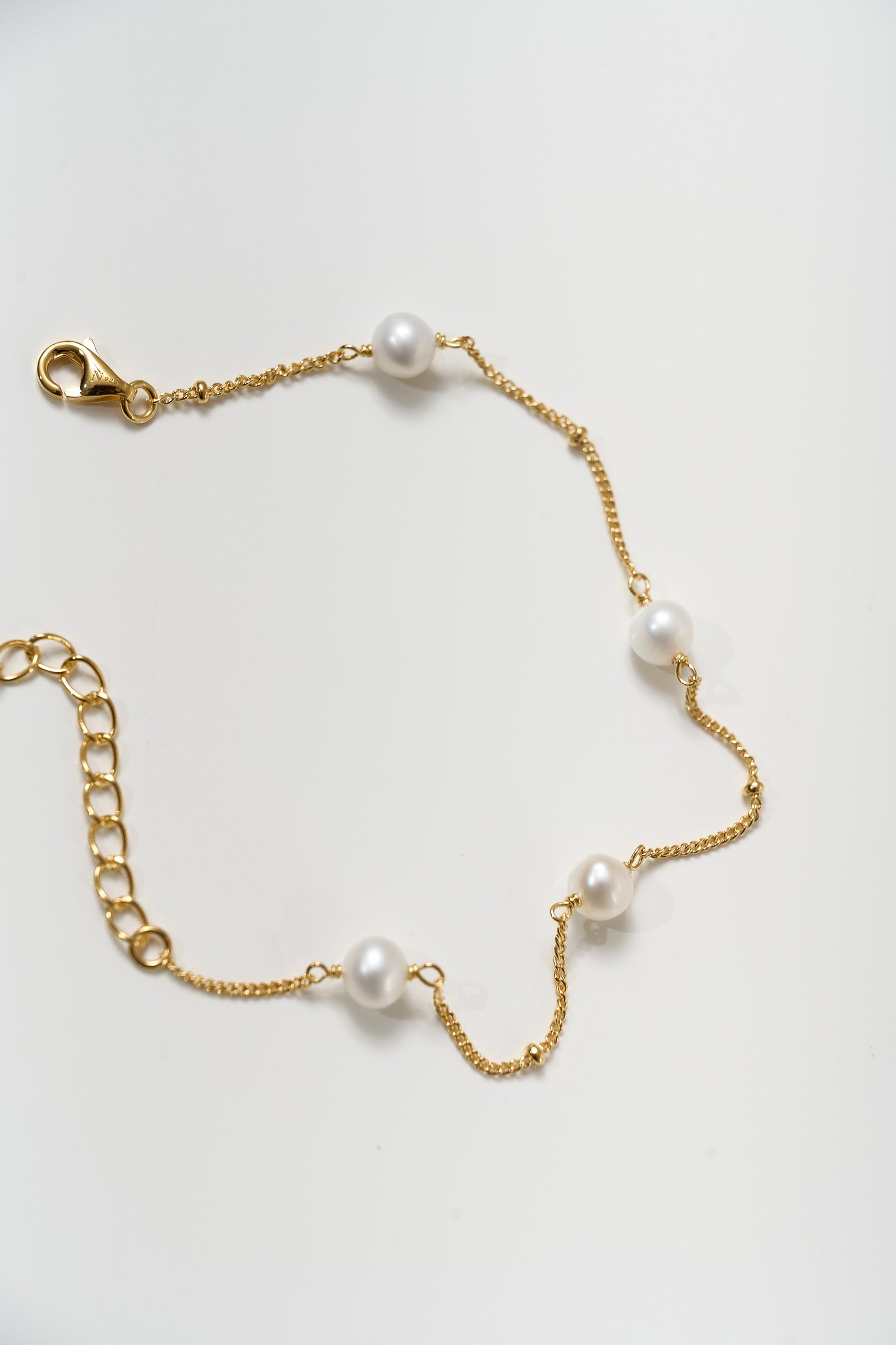 Shanai Bracelet with six pearls on delicate gold chain for a graceful, peaceful look