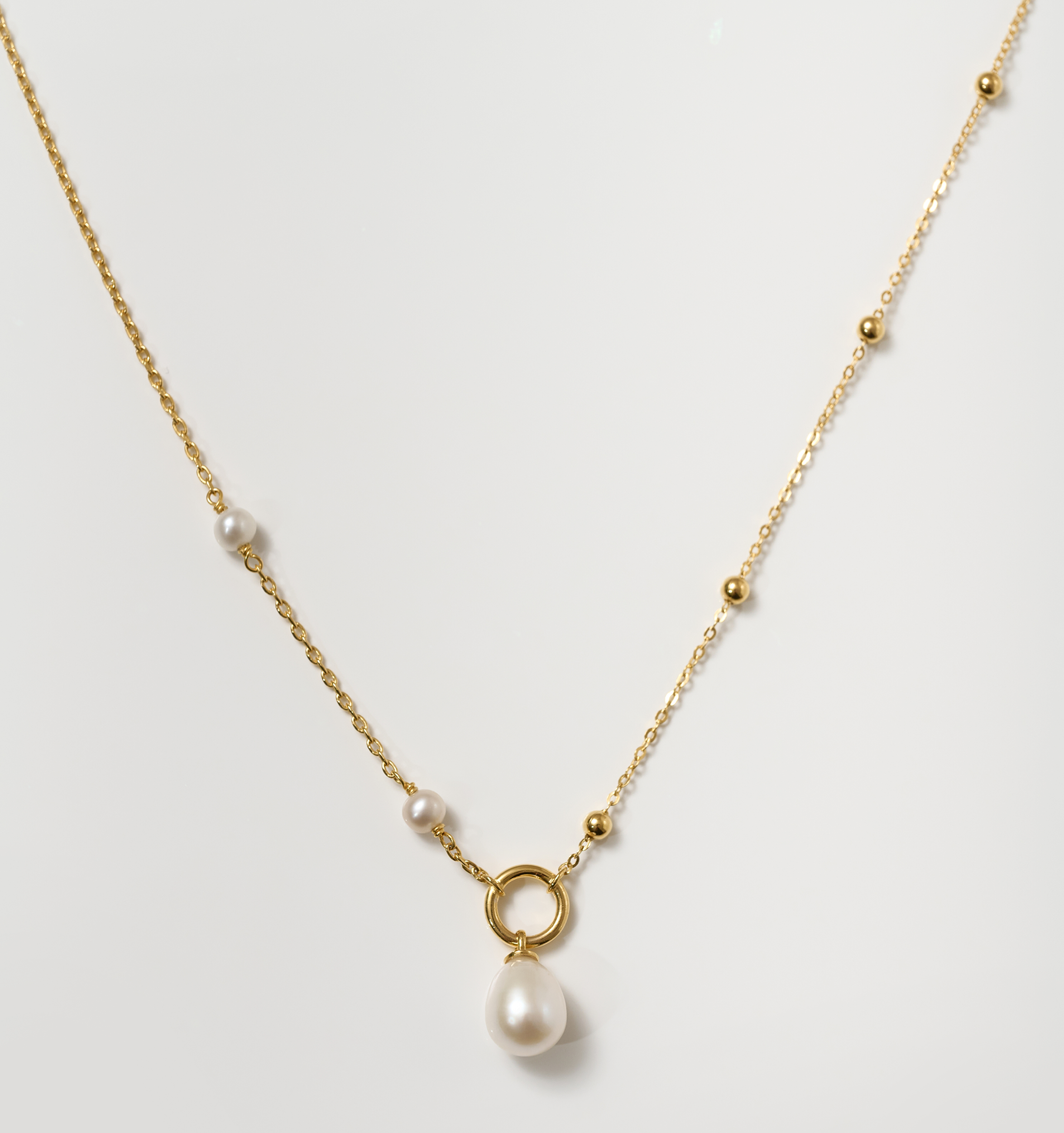 Argha Necklace with pearl pendant and gold chain featuring delicate gold beads