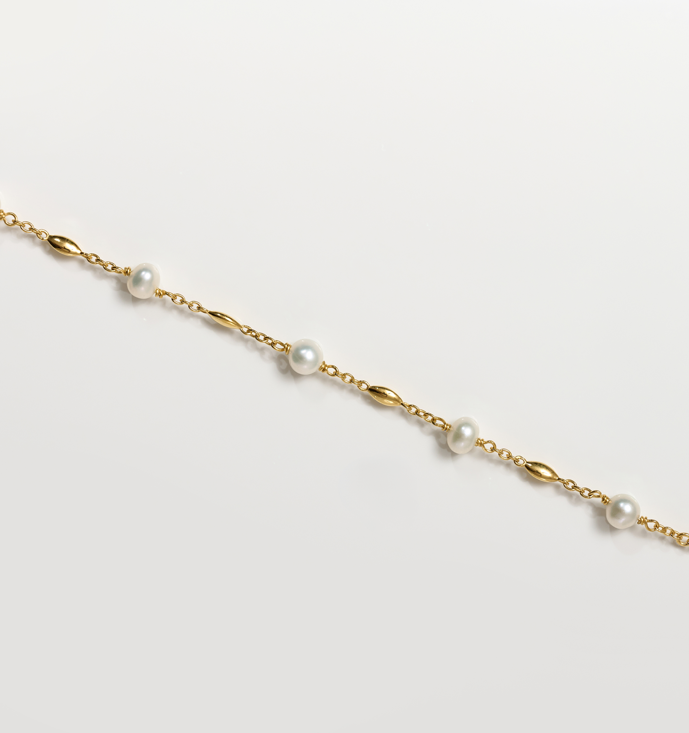 Manjari Necklace with five pearls and gold chain delicate design
