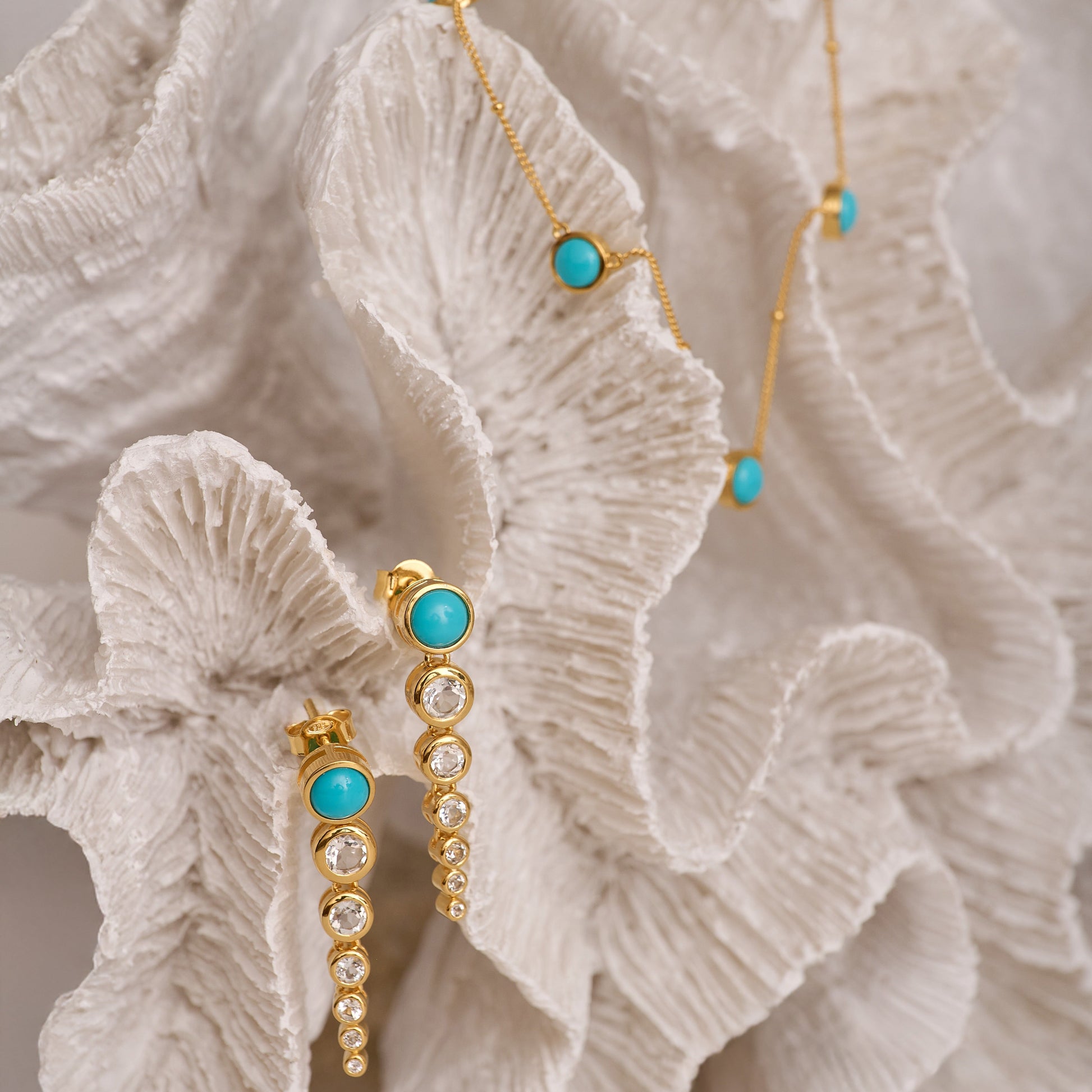 Vaani Necklace with turquoise stones and gold chain, symbolizing calm and throat chakra alignment