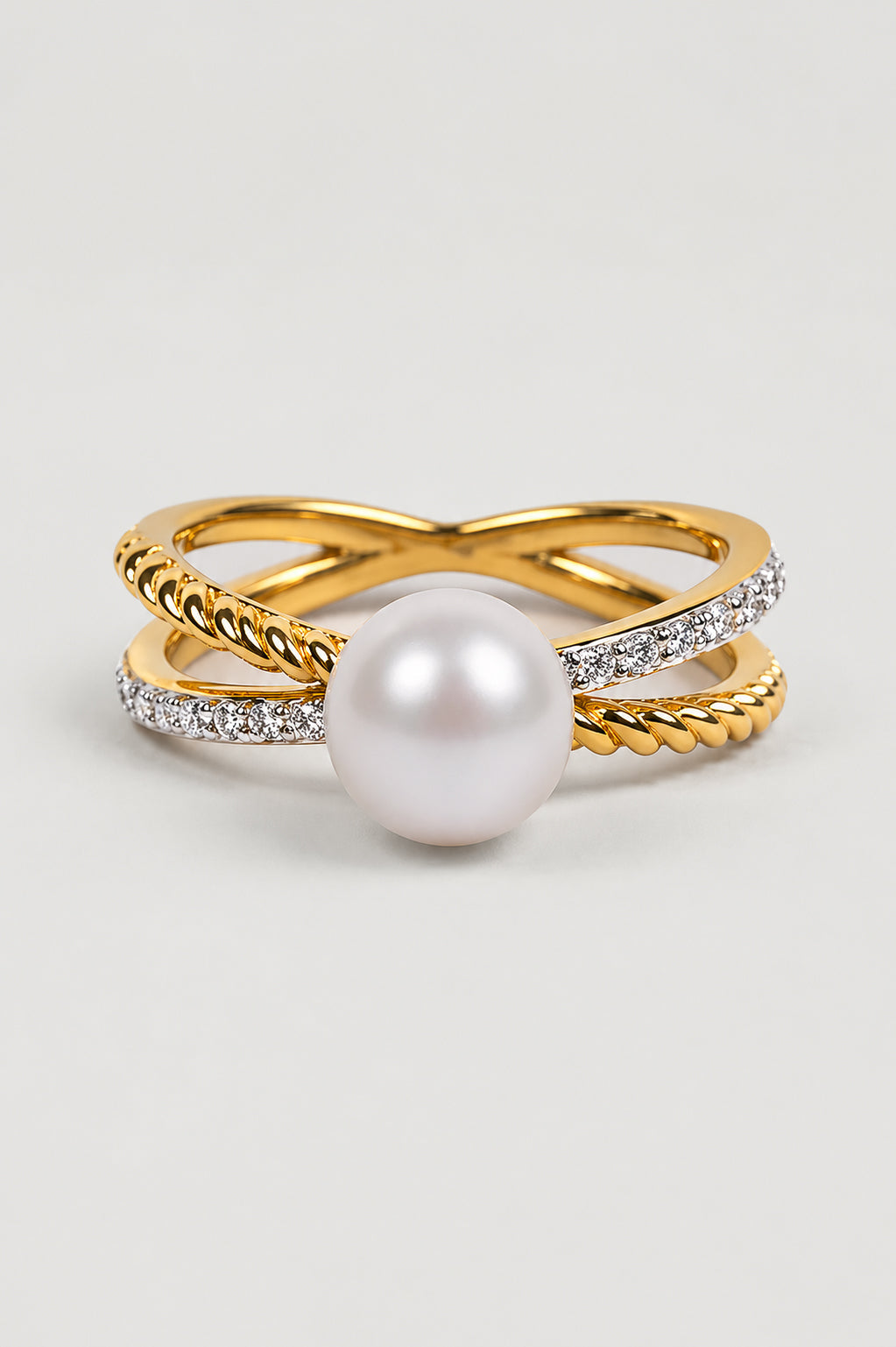 Paridhi Ring with pearl and lab-grown diamonds in a crossing design showcasing modern elegance and balance