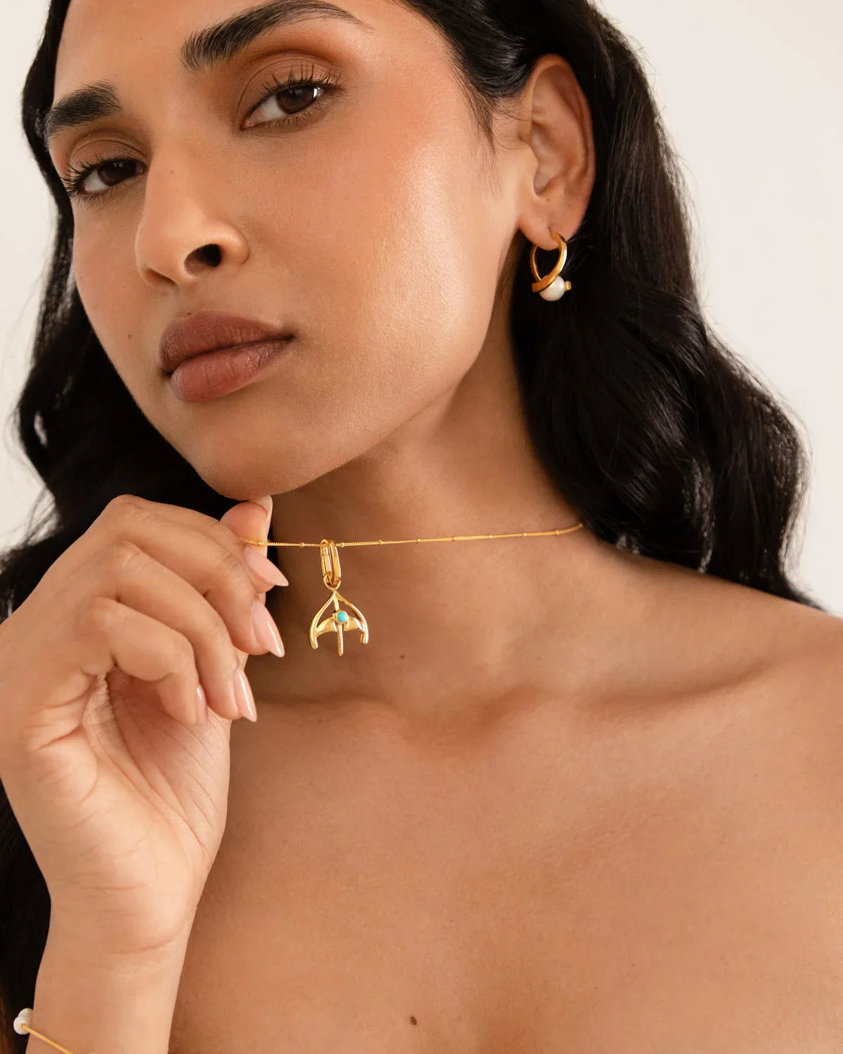 Sagittarius – Dhanu archer aiming at horizon with turquoise background symbolizing wisdom and Jupiter influence