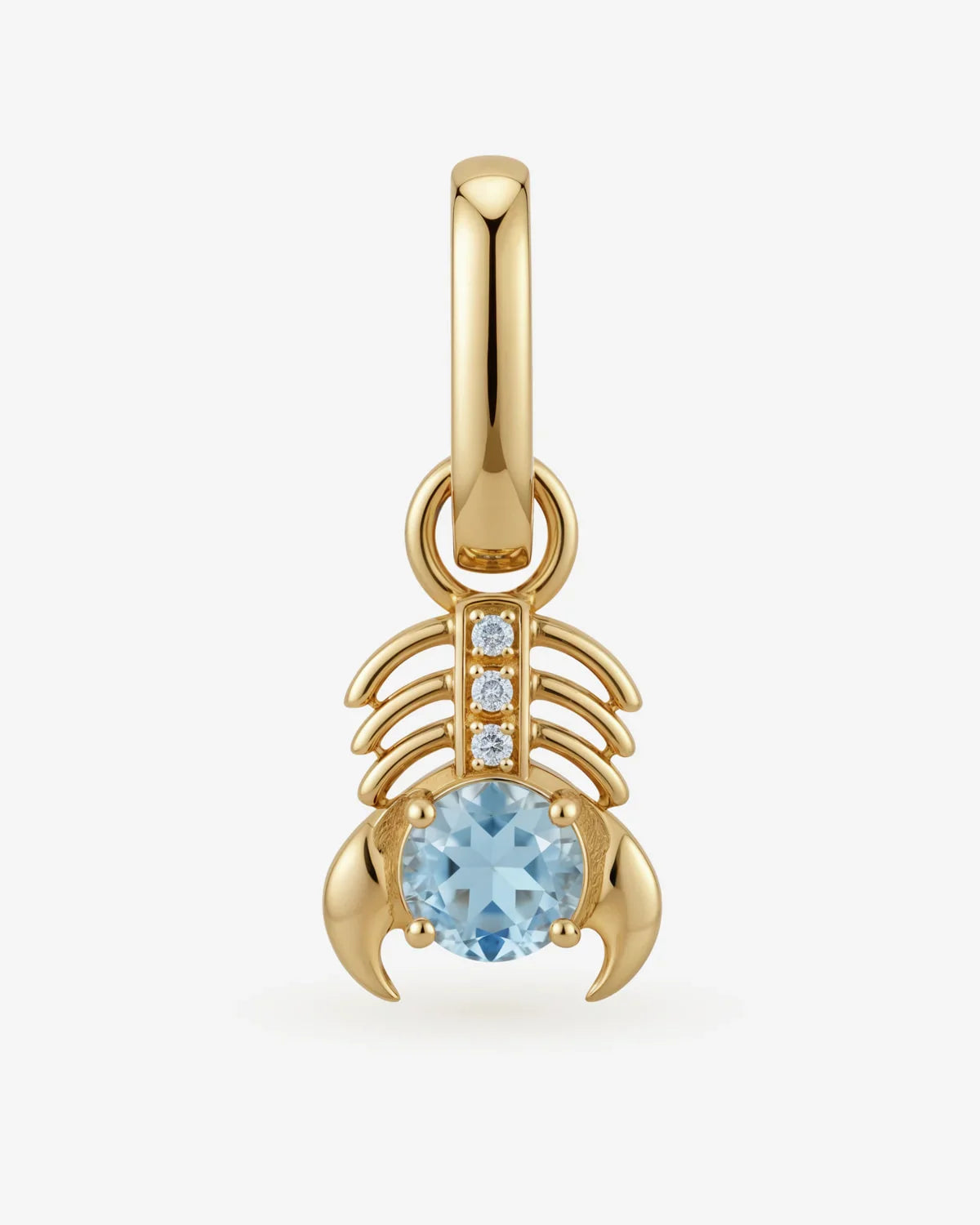 Scorpio Vrischika zodiac symbol with sky blue topaz and diamond representing transformation and depth