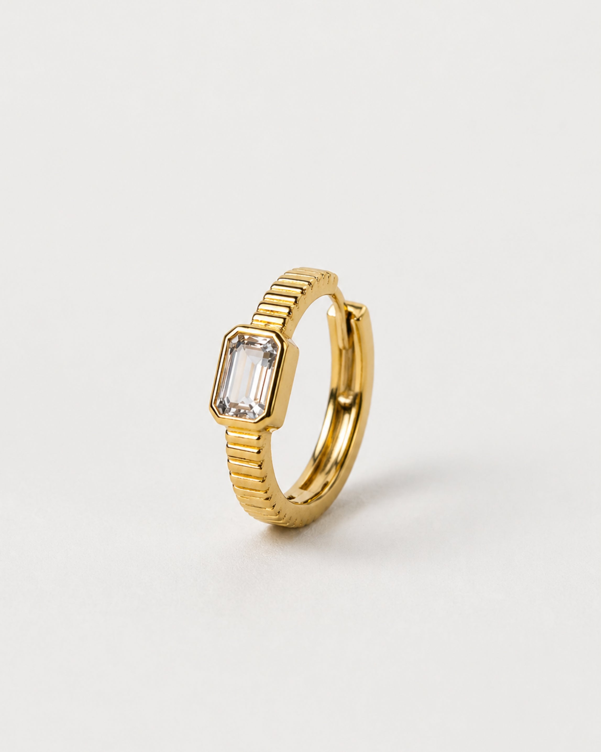 Shuddhi Huggies sculptural earrings with faceted white topaz in geometric setting