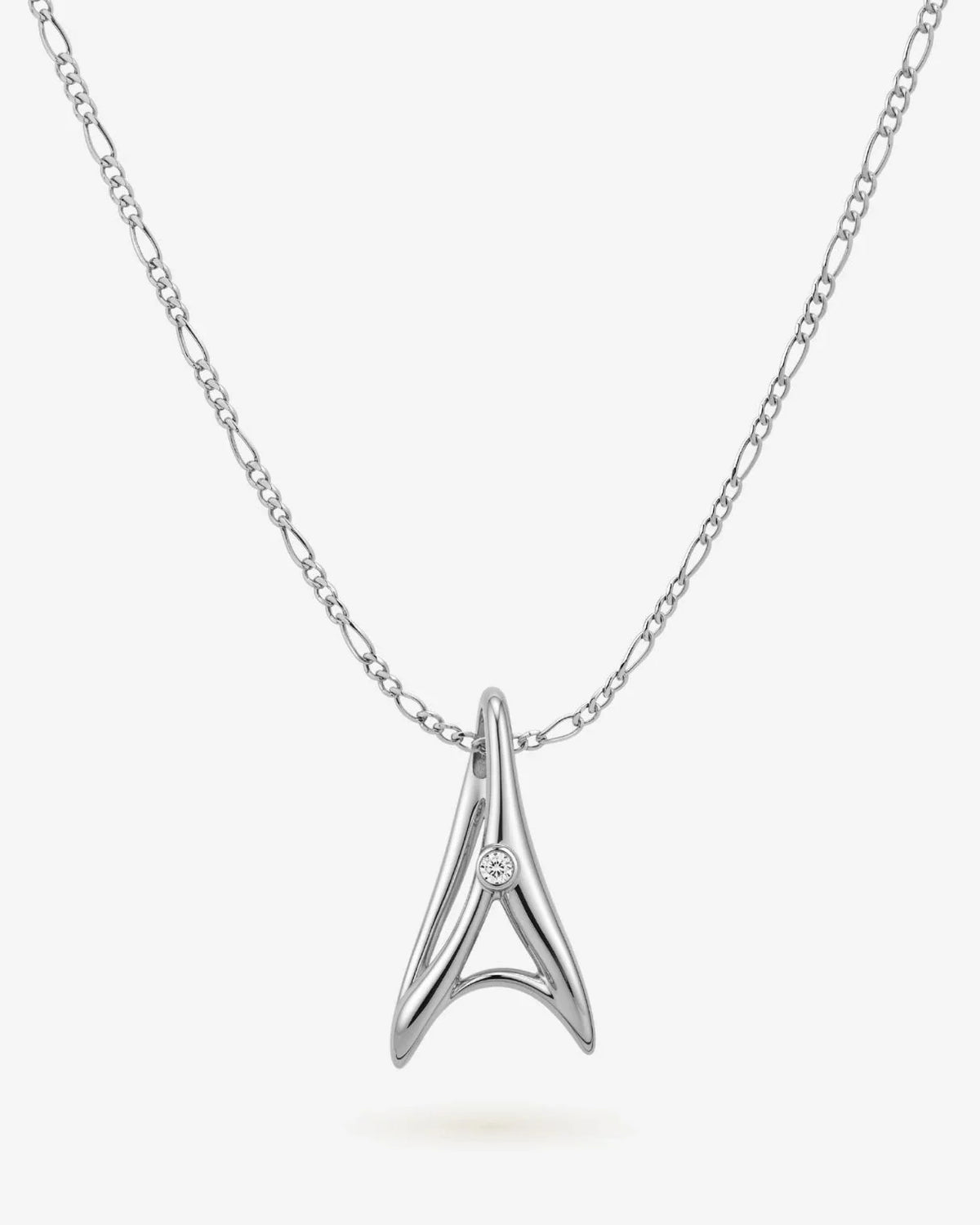 A ए Initial Necklace in polished silver-tone metal, featuring an angular letter A pendant with a small round stone detail.