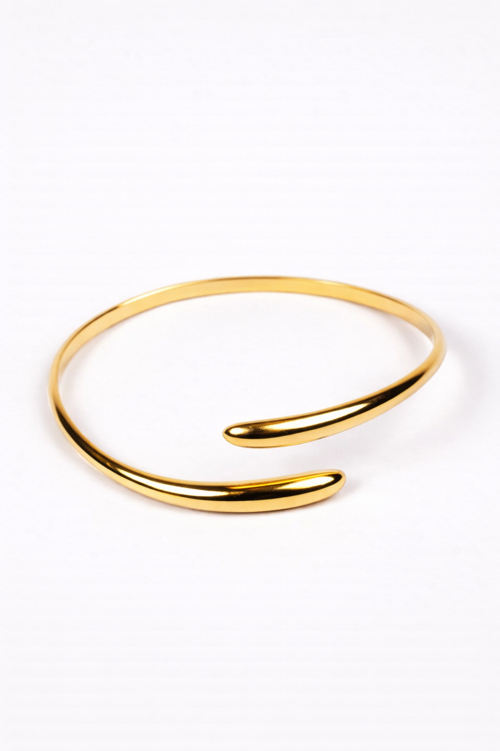 Avrat Cuff sculptural open-ended spiral wrist bracelet with Indian design influence