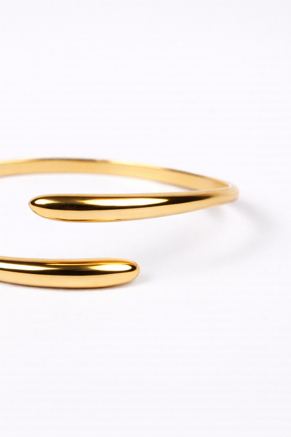 Avrat Cuff sculptural open-ended spiral wrist bracelet reflecting Indian design and modern style
