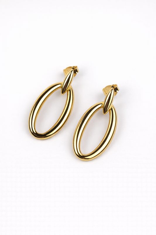 Avas Earring with open oval organic silhouette highlighting light and space
