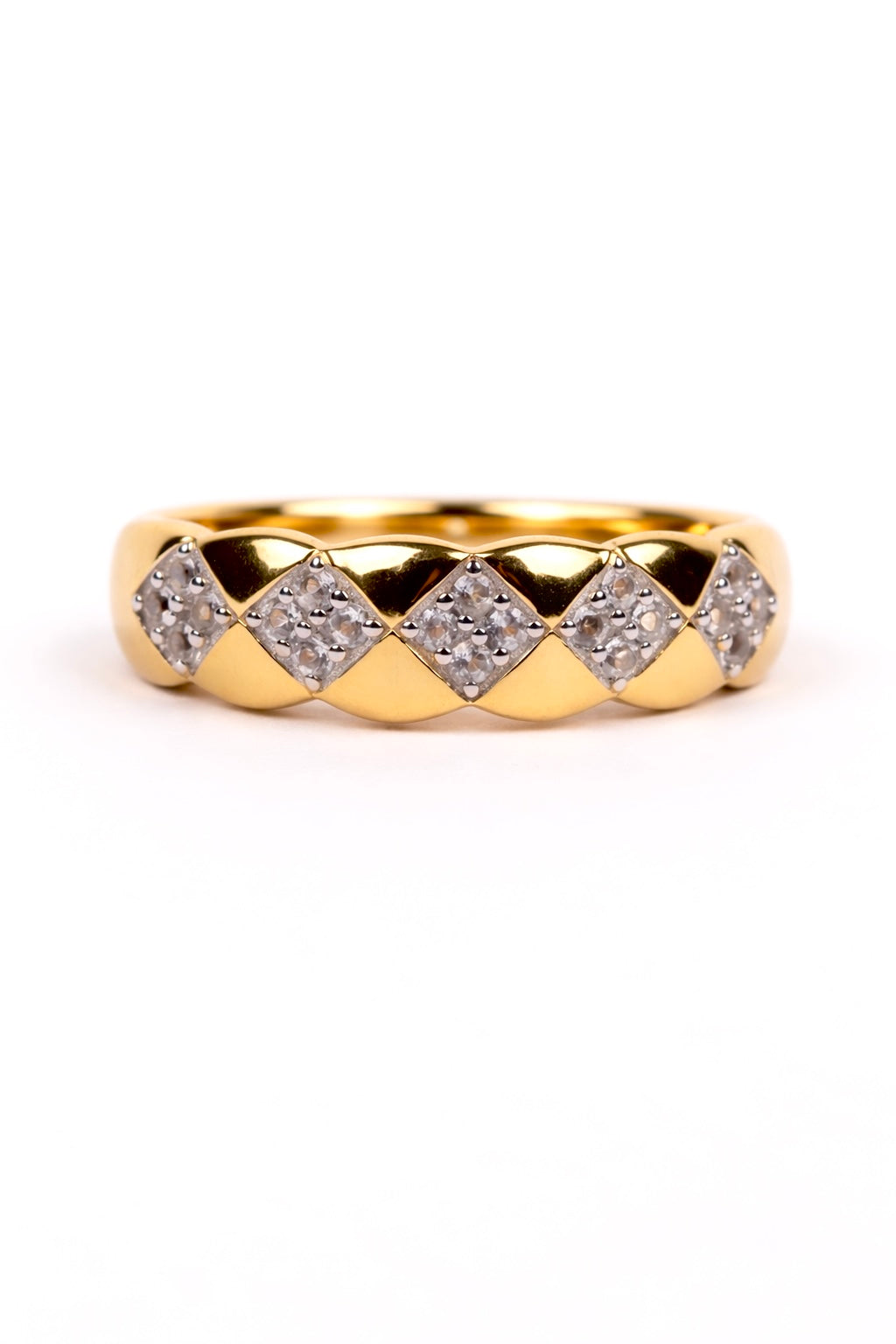 Taal Ring with white topaz stones set in a modern gold band showcasing rhythm and precision