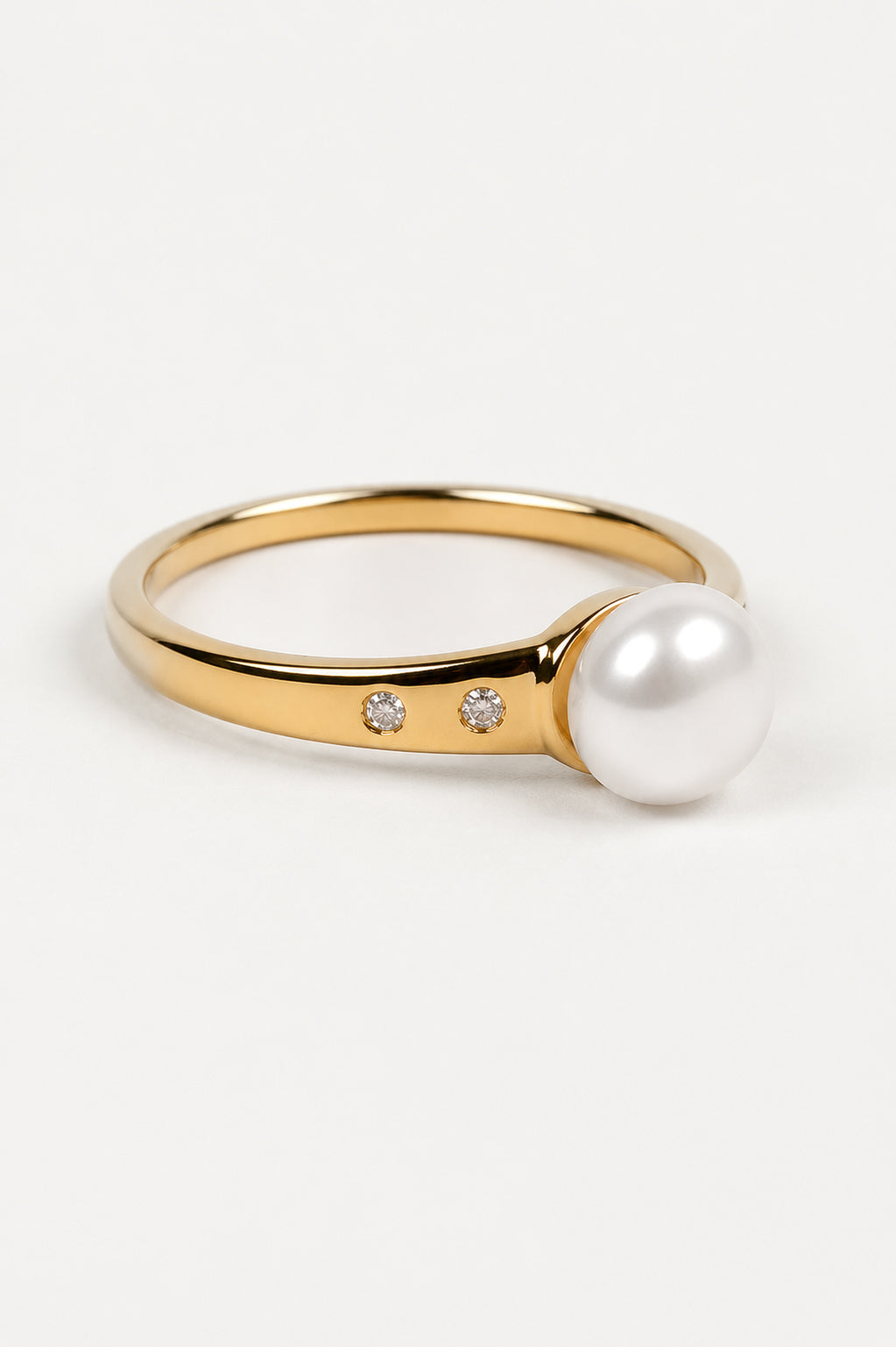 Deepa Ring with central luminous pearl surrounded by lab-grown diamonds radiating light
