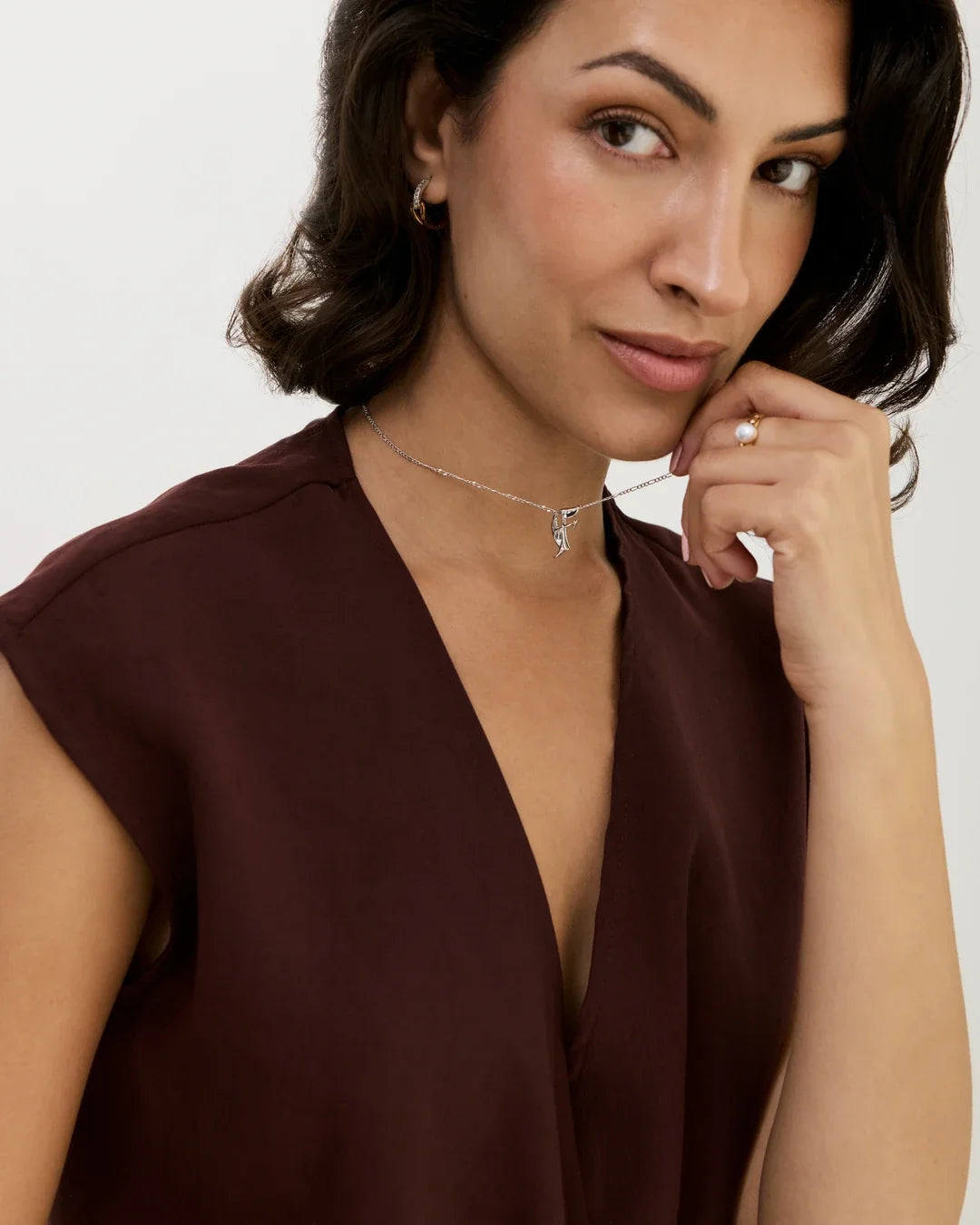 F एफ Initial Necklace in a fine silver-tone chain with a delicate dangling letter charm.